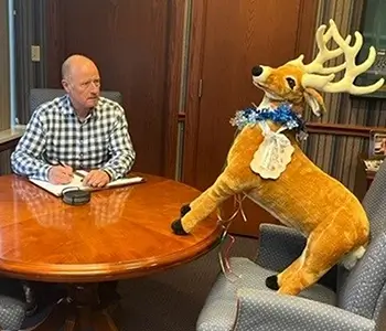 Stuffed Reindeer having a meeting with our President