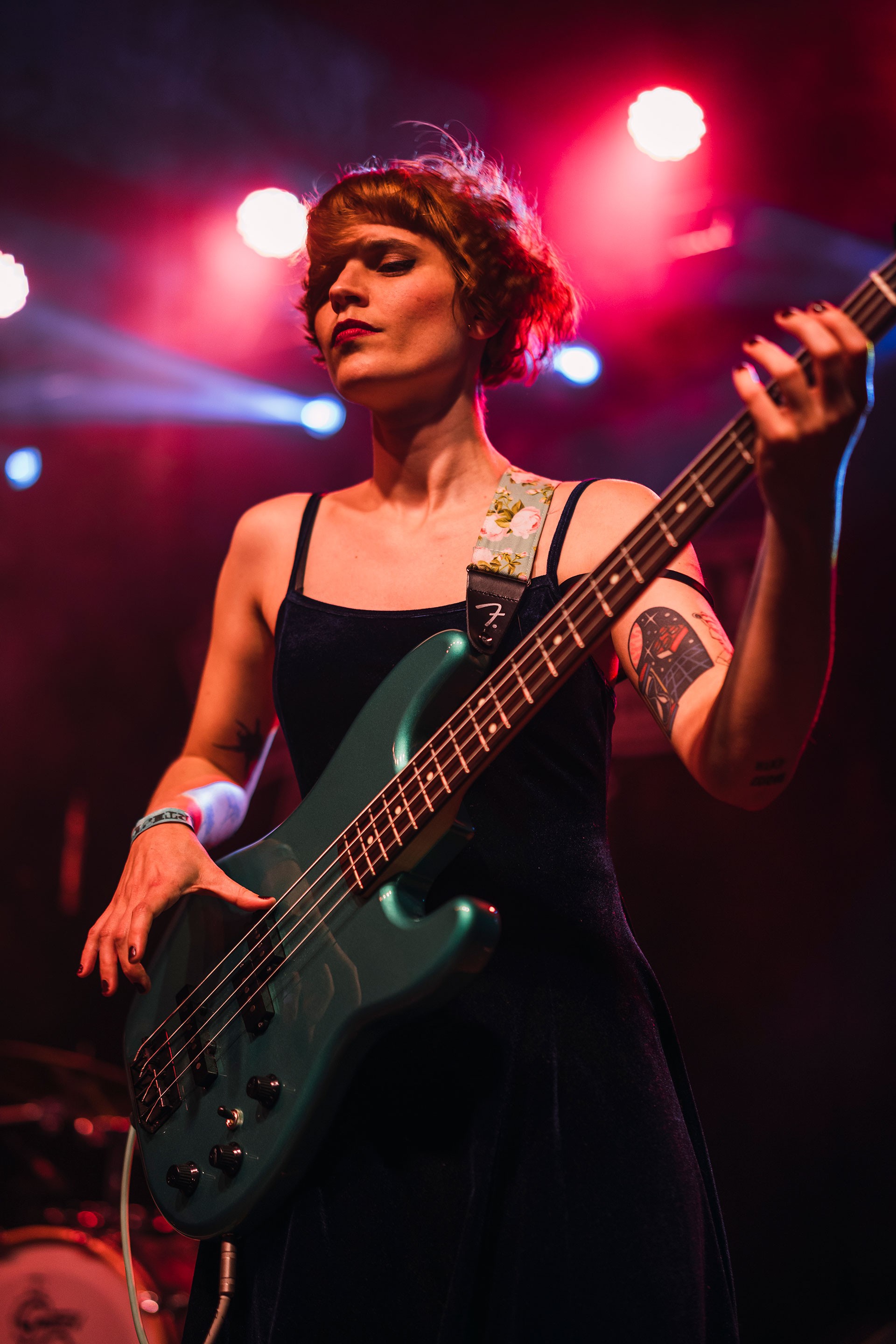 Green vinyl record playing on a turntable.