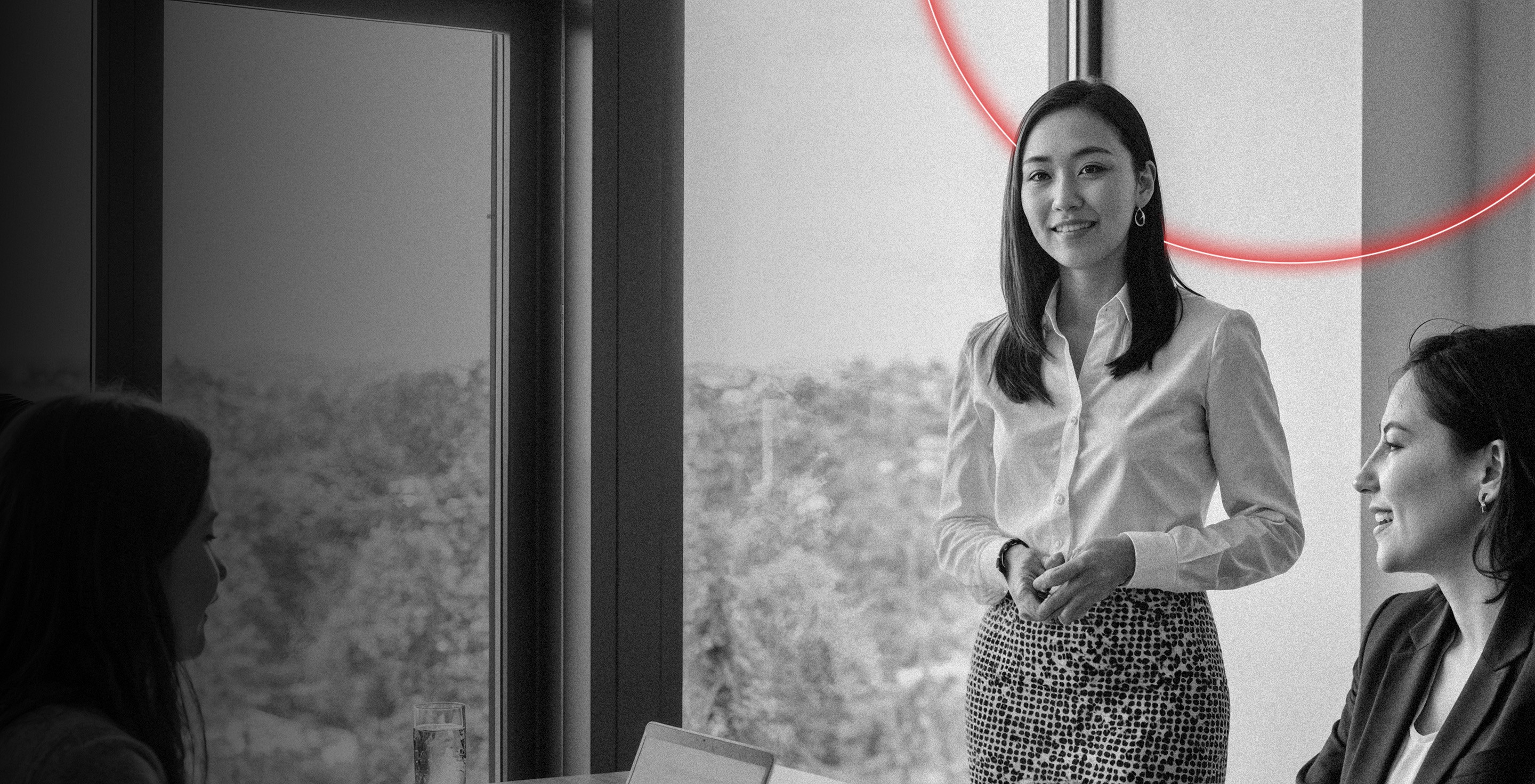 Women presenting in office block 