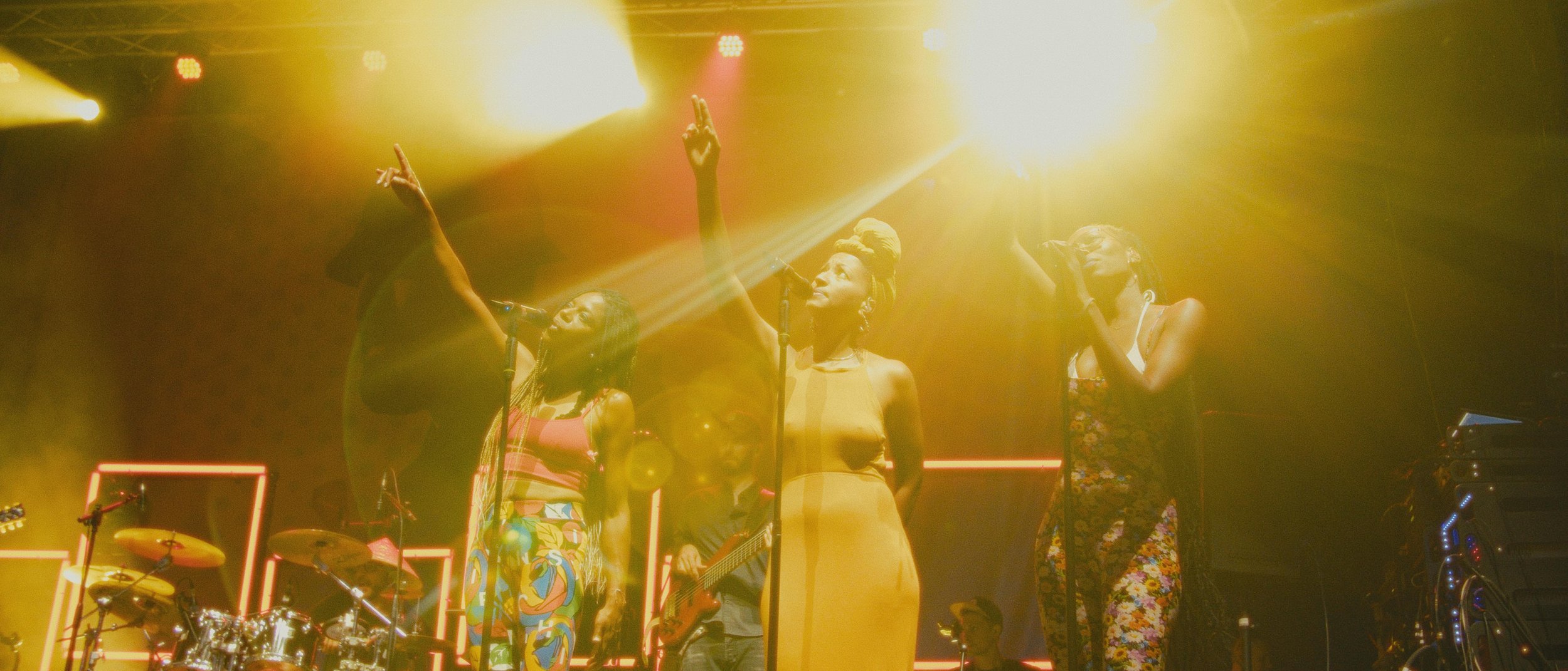 Streetside billboard with flyposters of the Batch.Works brand and illustrations