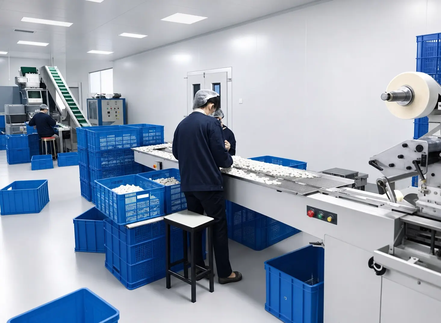 Efficient packaging and assembly line for wholesale hotel supplies, ensuring sterile and standardized production.