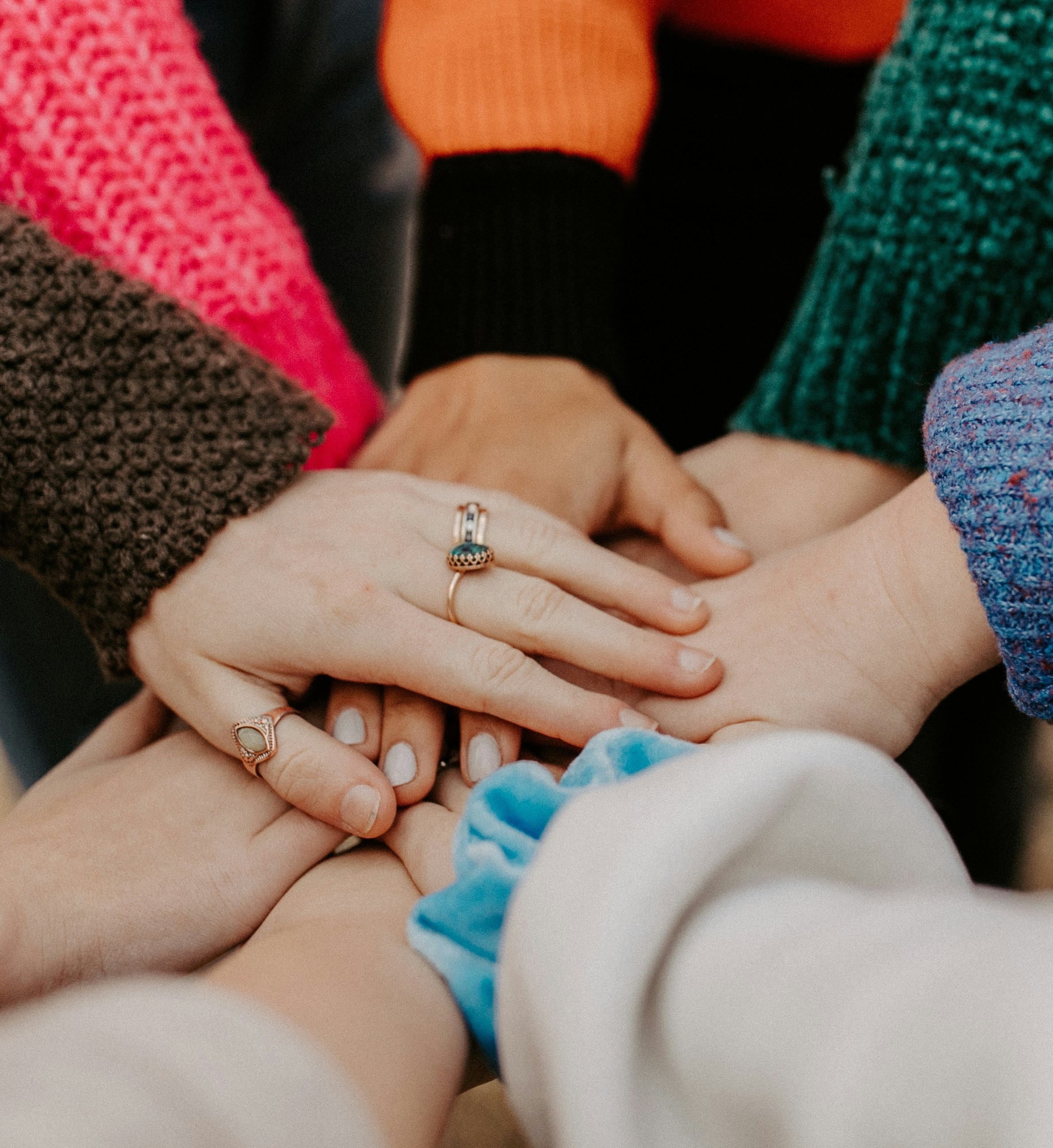 Person smiling warmly in sunlight