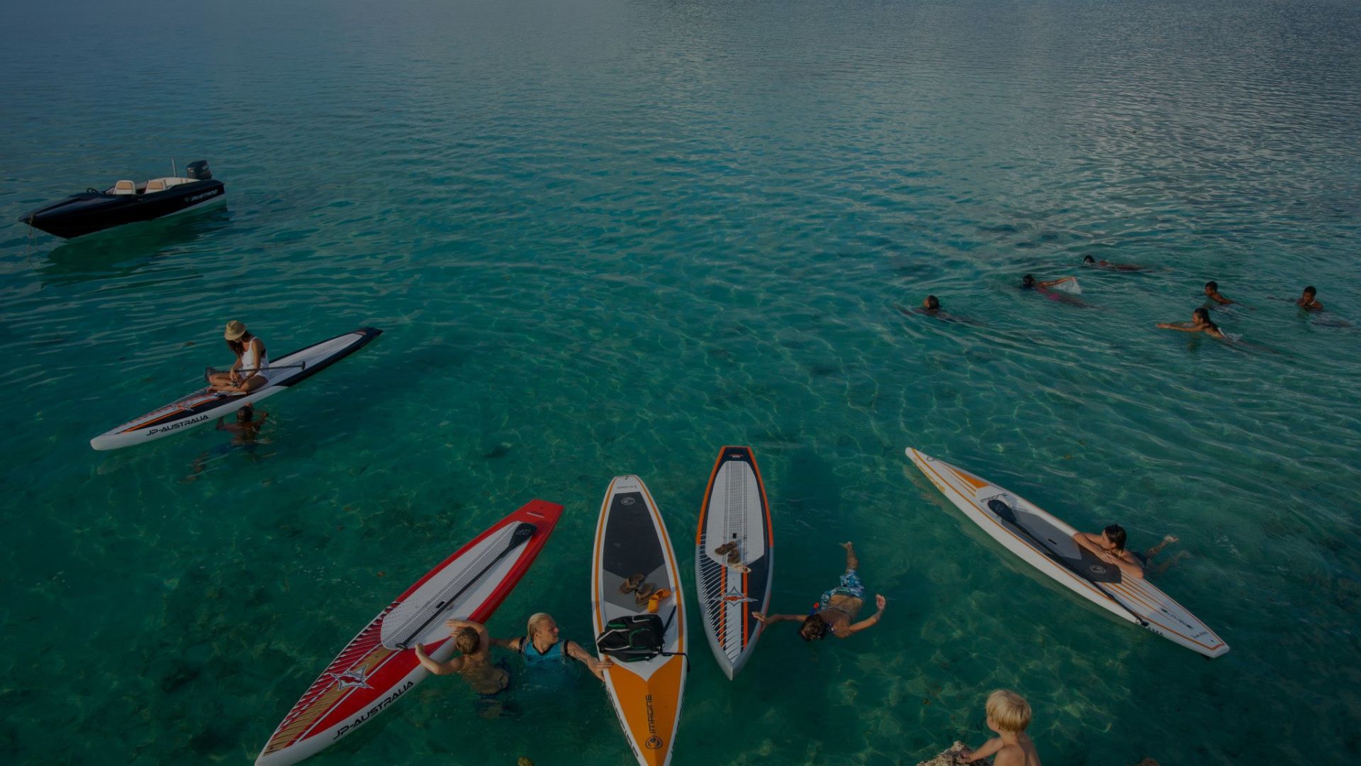 a crowd of people watching a fireworks display
