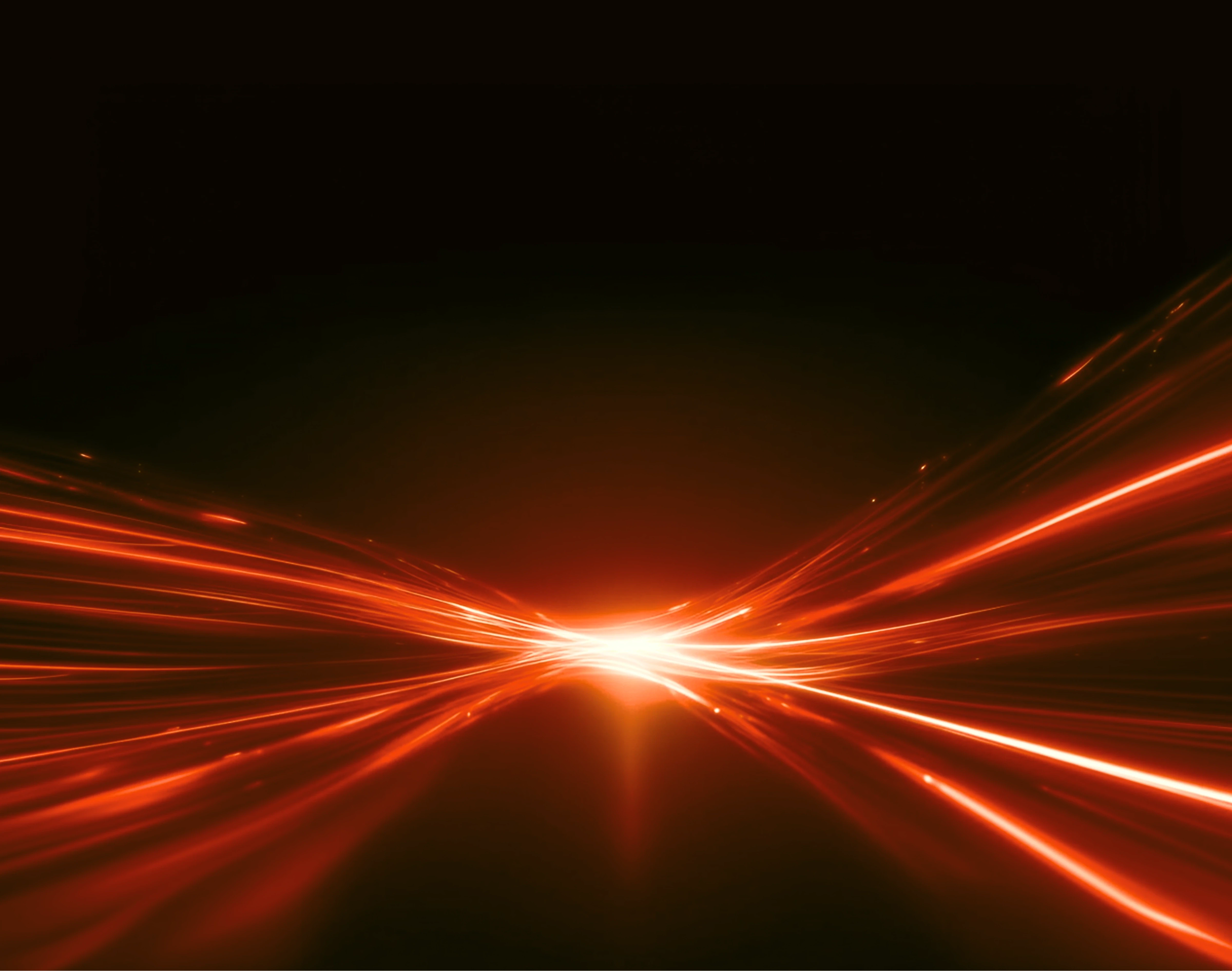 Abstract red light streaks converging at center on dark background symbolizing speed and automation