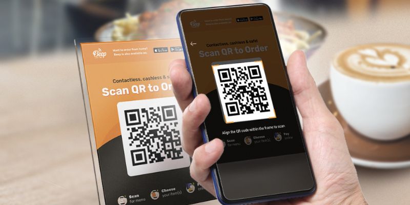 Scanning a QR code on your phone to order and pay