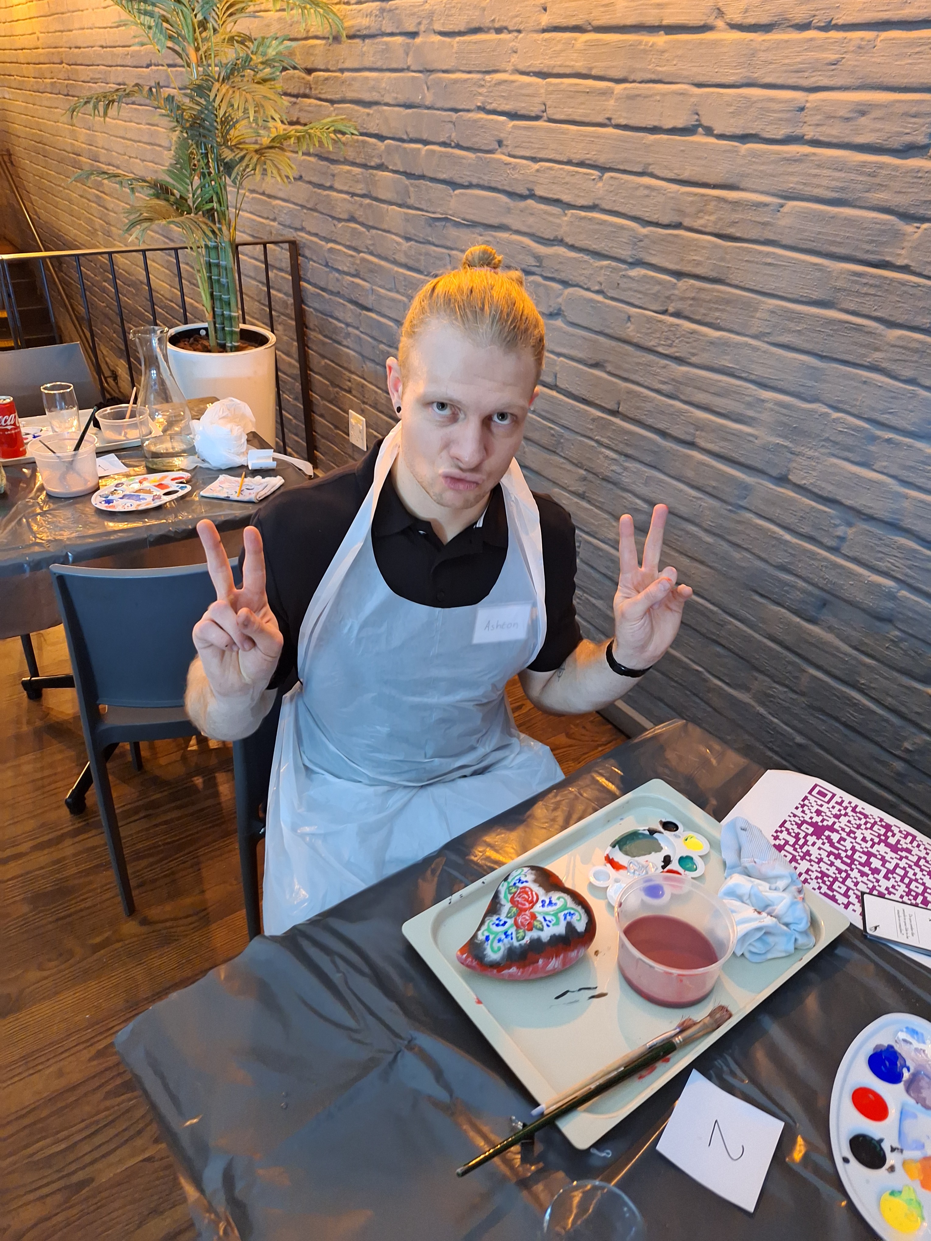 A man smiling and posing for a picture