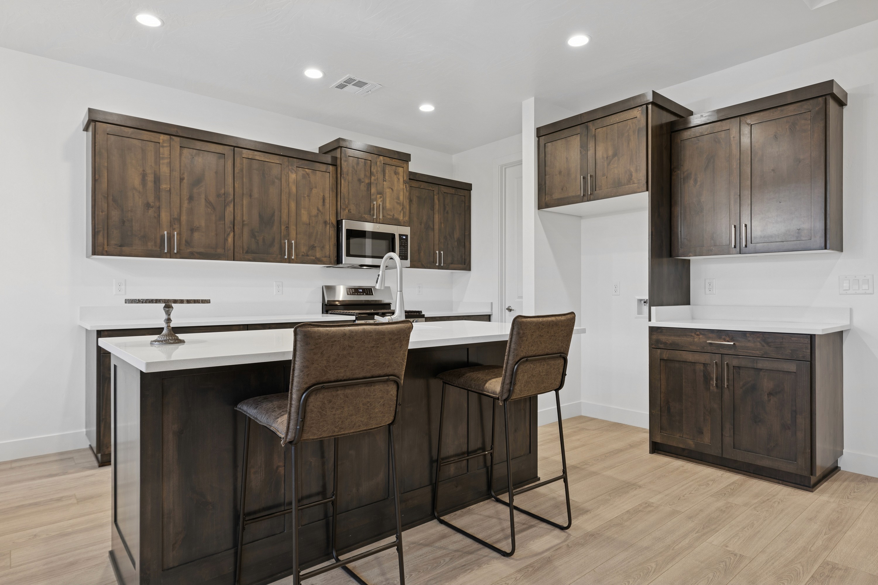 Kitchen with ample cabinet space and modern appliances in Hurricane Utah home.