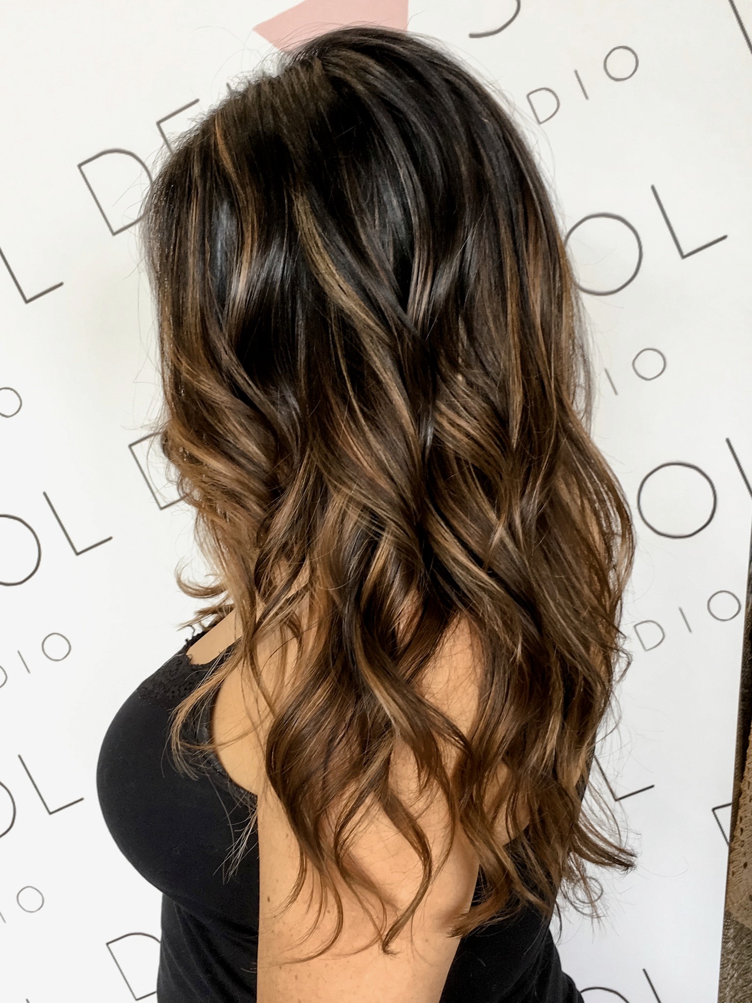 Dimensional brunette at Del Sol Hair Studio in Huntington Beach