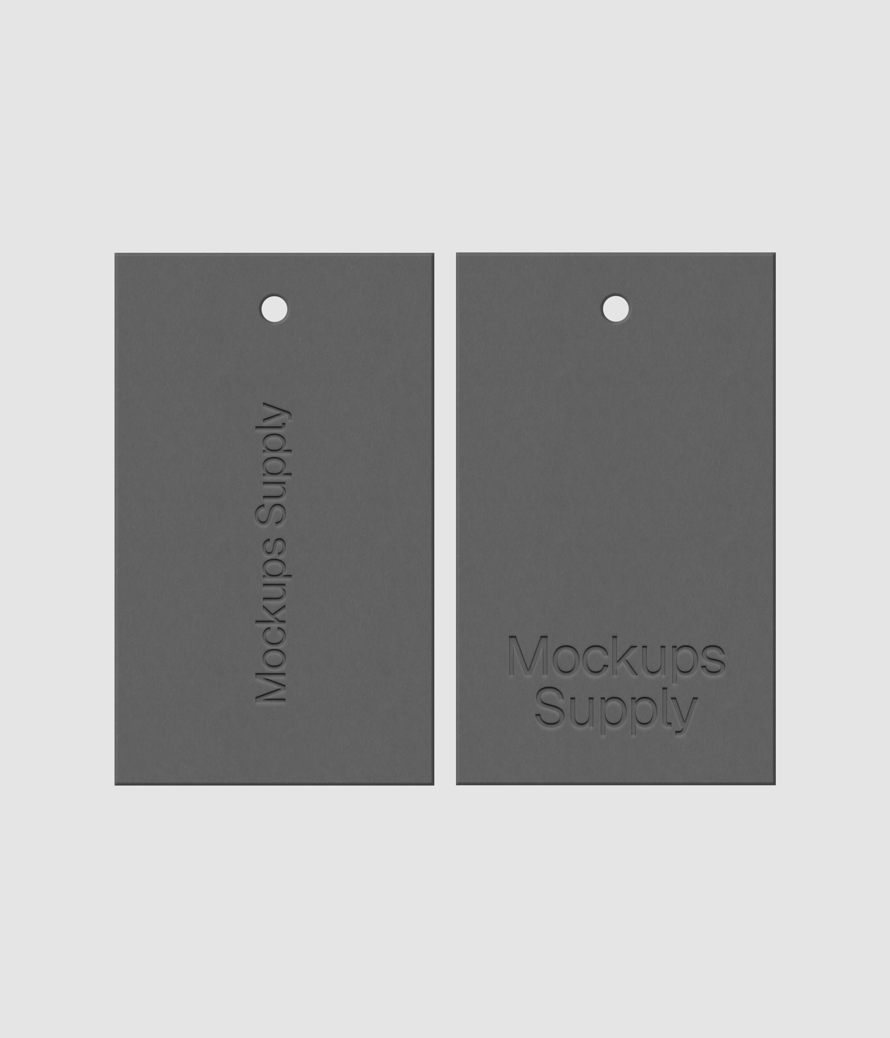 Two gray 3x5 hang tags mockup on white background with realistic debossed logo effect for Photoshop download psd