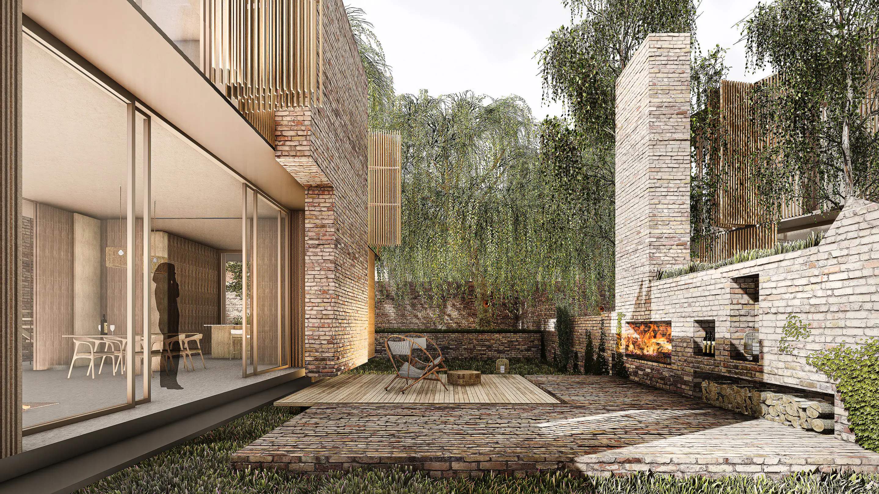 Ömerli Villas: view from the glazed living room to the stone-walled courtyard and fireplace