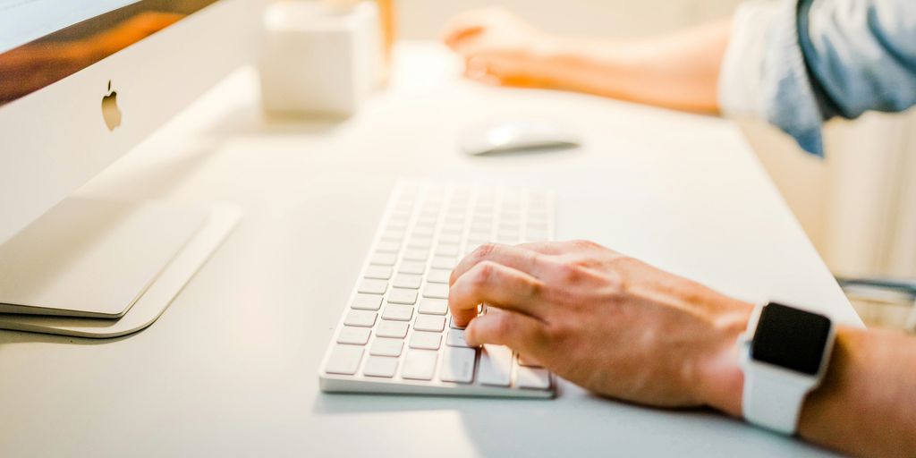 person using iMac