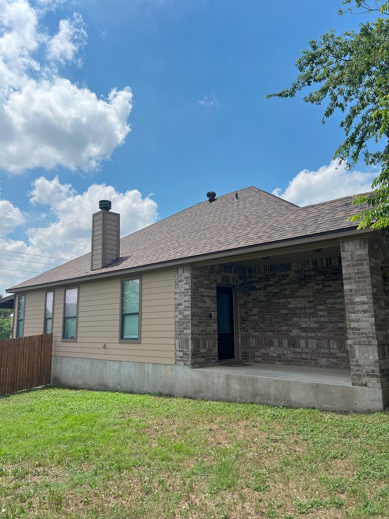 Beautiful House with Large Windows and Shingles Roof