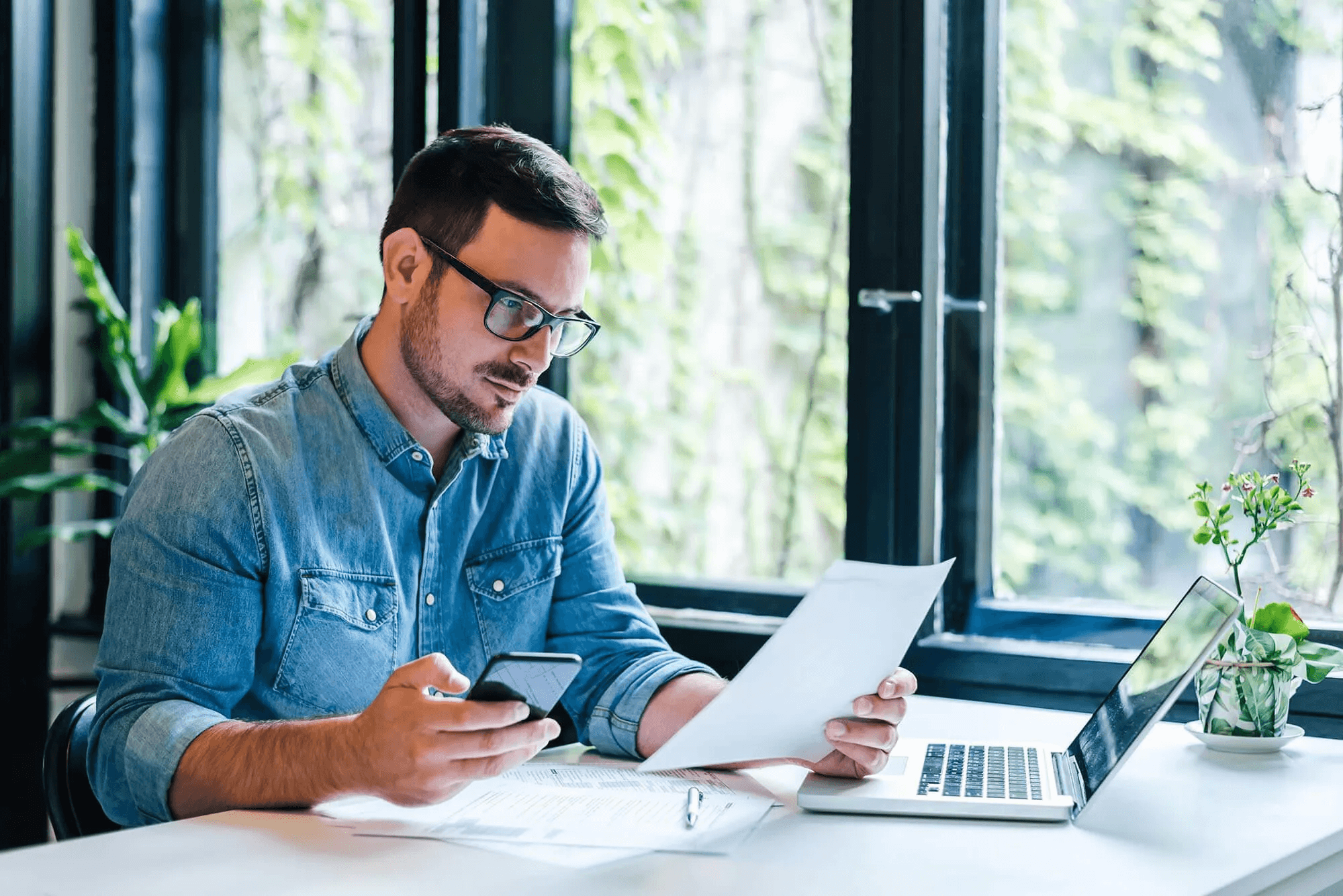 man wearing a denim shirt - Financial Data Categorization Rules Examples