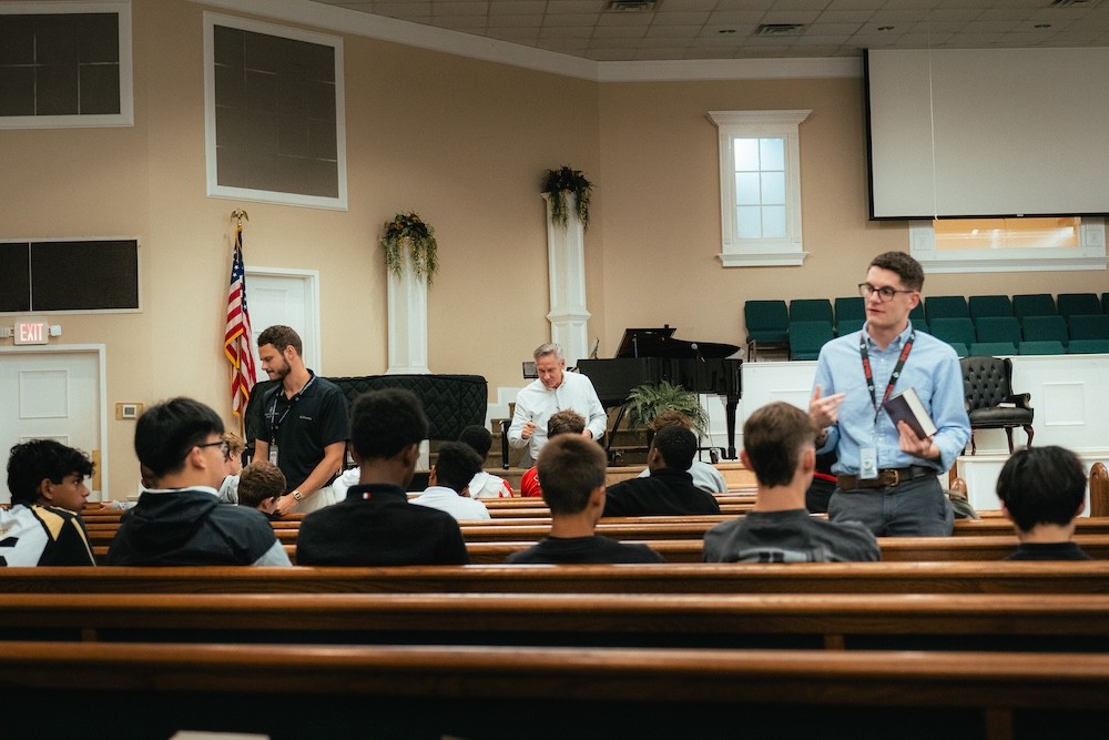Three of our pastors, working with small groups after a chapel message