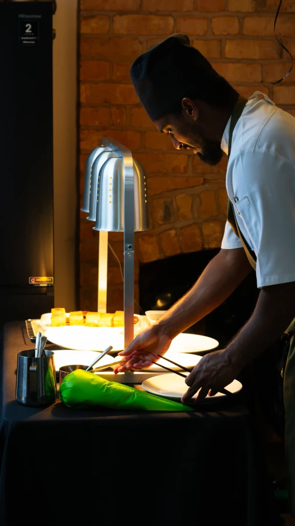 Josh at the pass in the warm light of the heat lamps