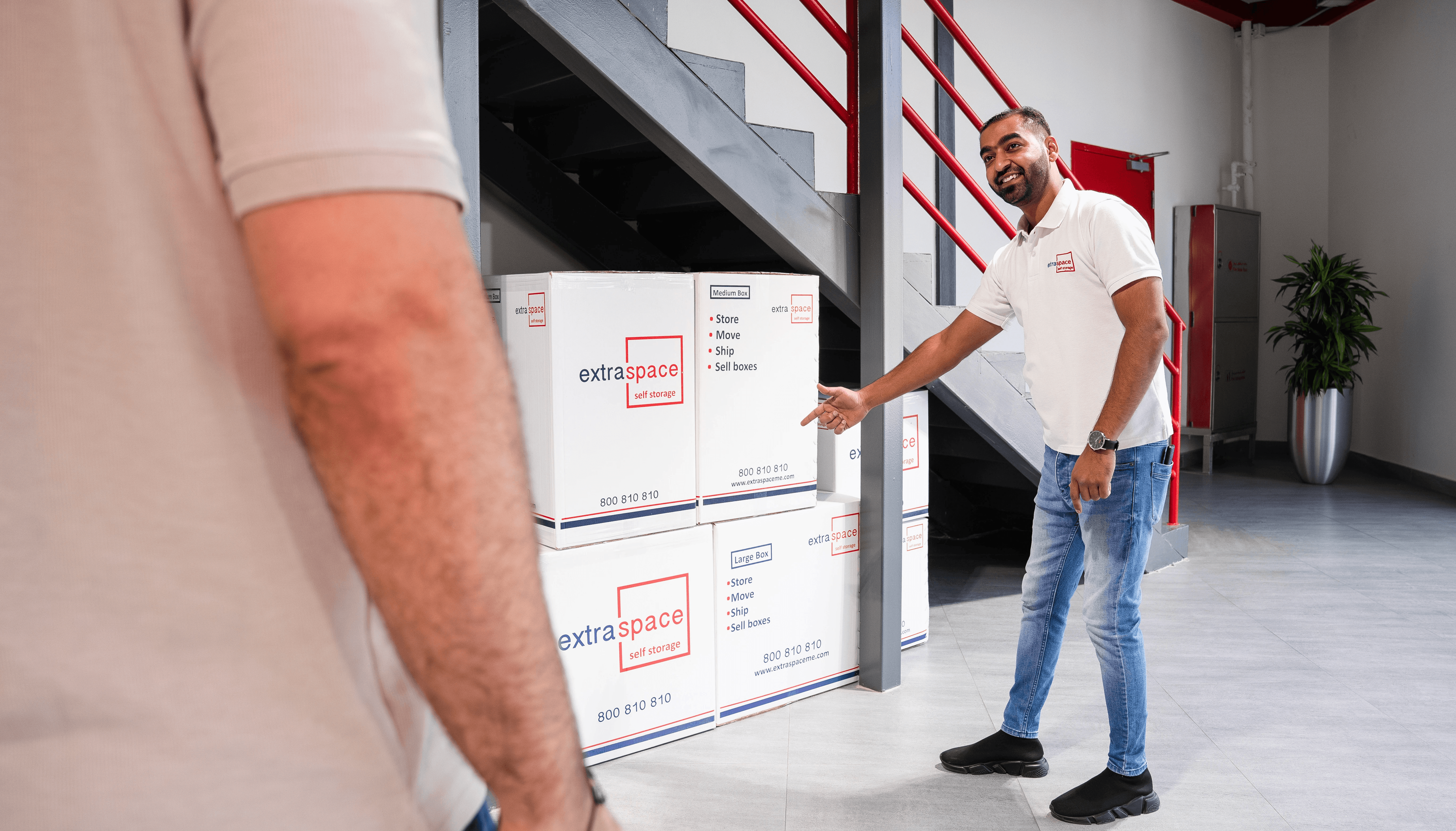 Professional movers helping load moving boxes for a smoother and easier move home.&nbsp;