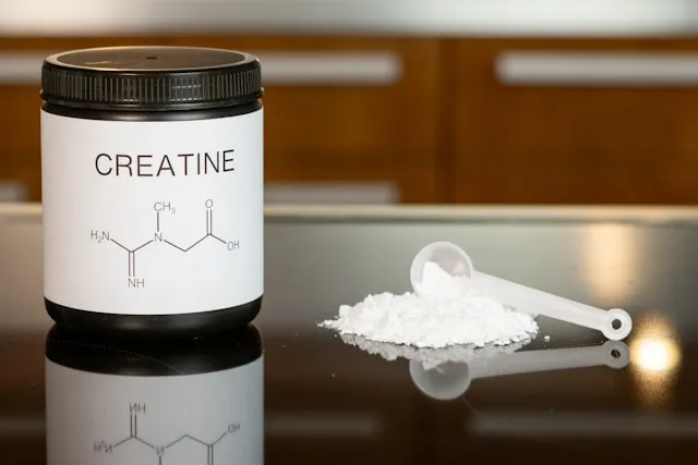Creatine Supplement monohydrate powder in the bottle 