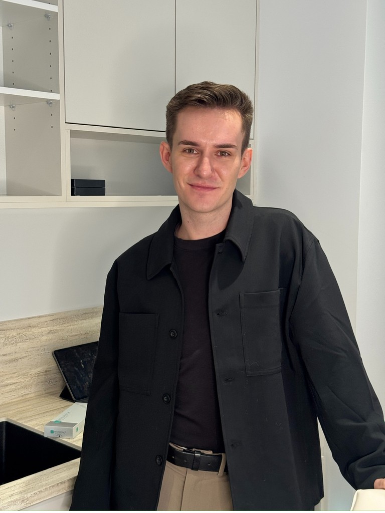 Two people stretching on yoga mats