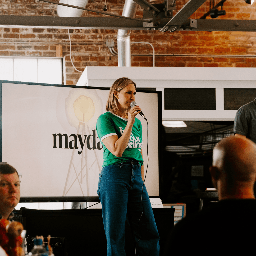 Person pouring oil on zucchini