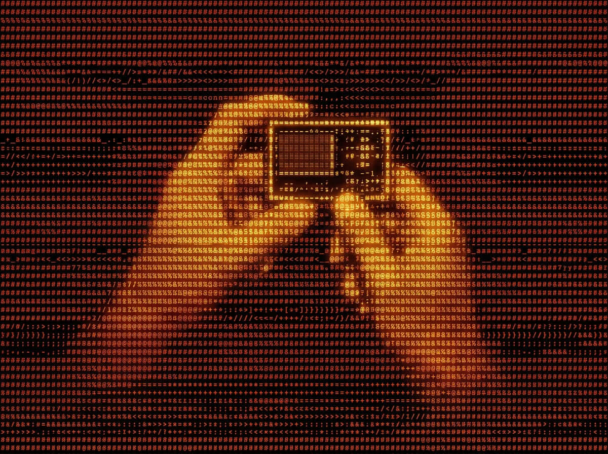 a top-down view of two hands holding and interacting with a small, rectangular hardware device or handheld console.