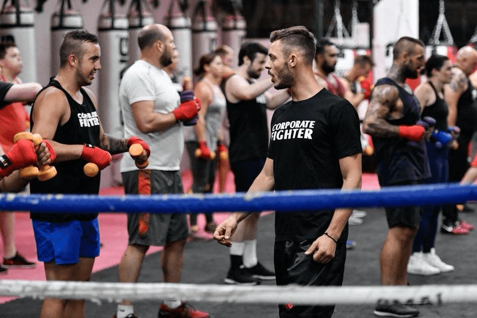 Danilo Dash Creati running a group boxing session with a group of boxers for a training session.