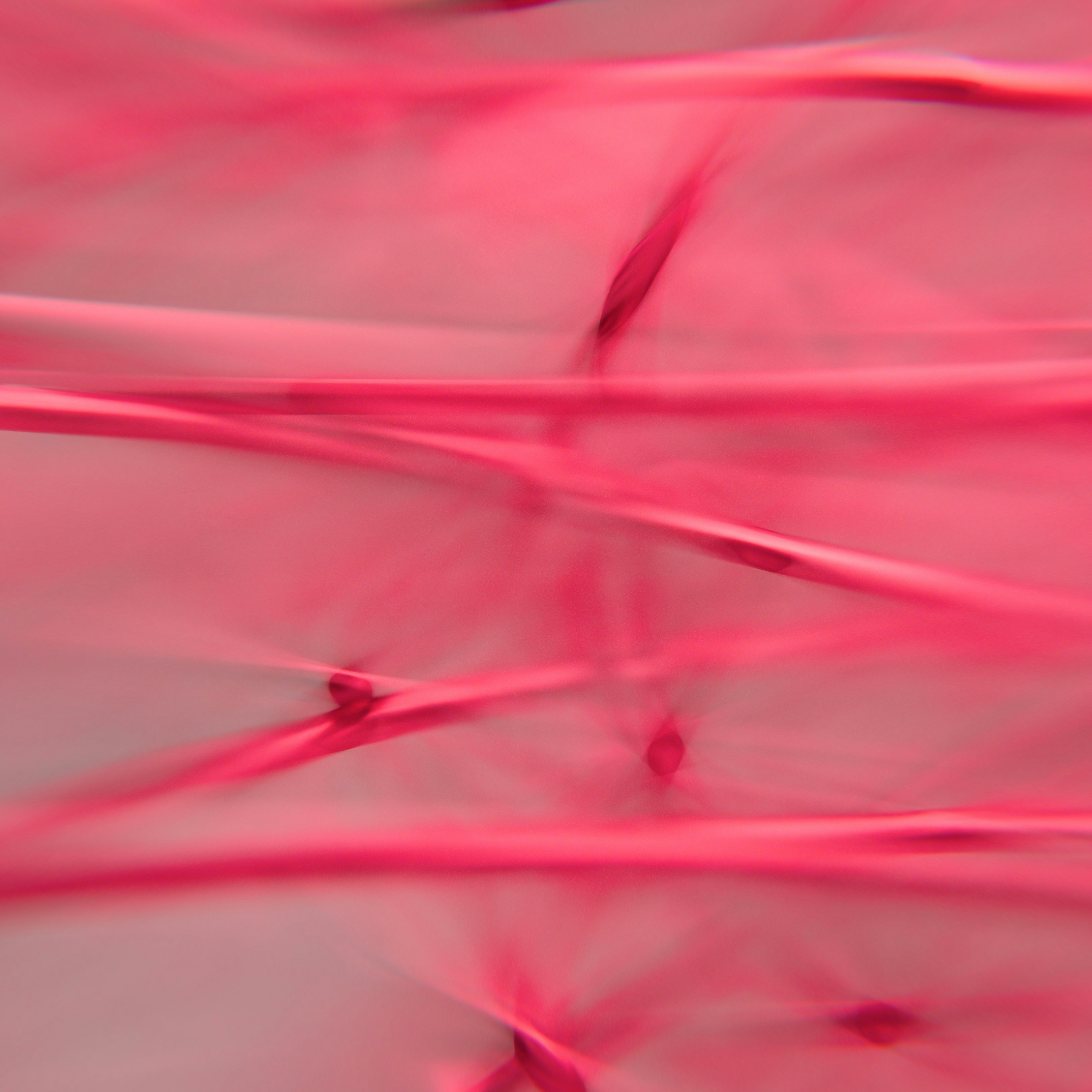 Abstract pink lines and shapes with blurred background
