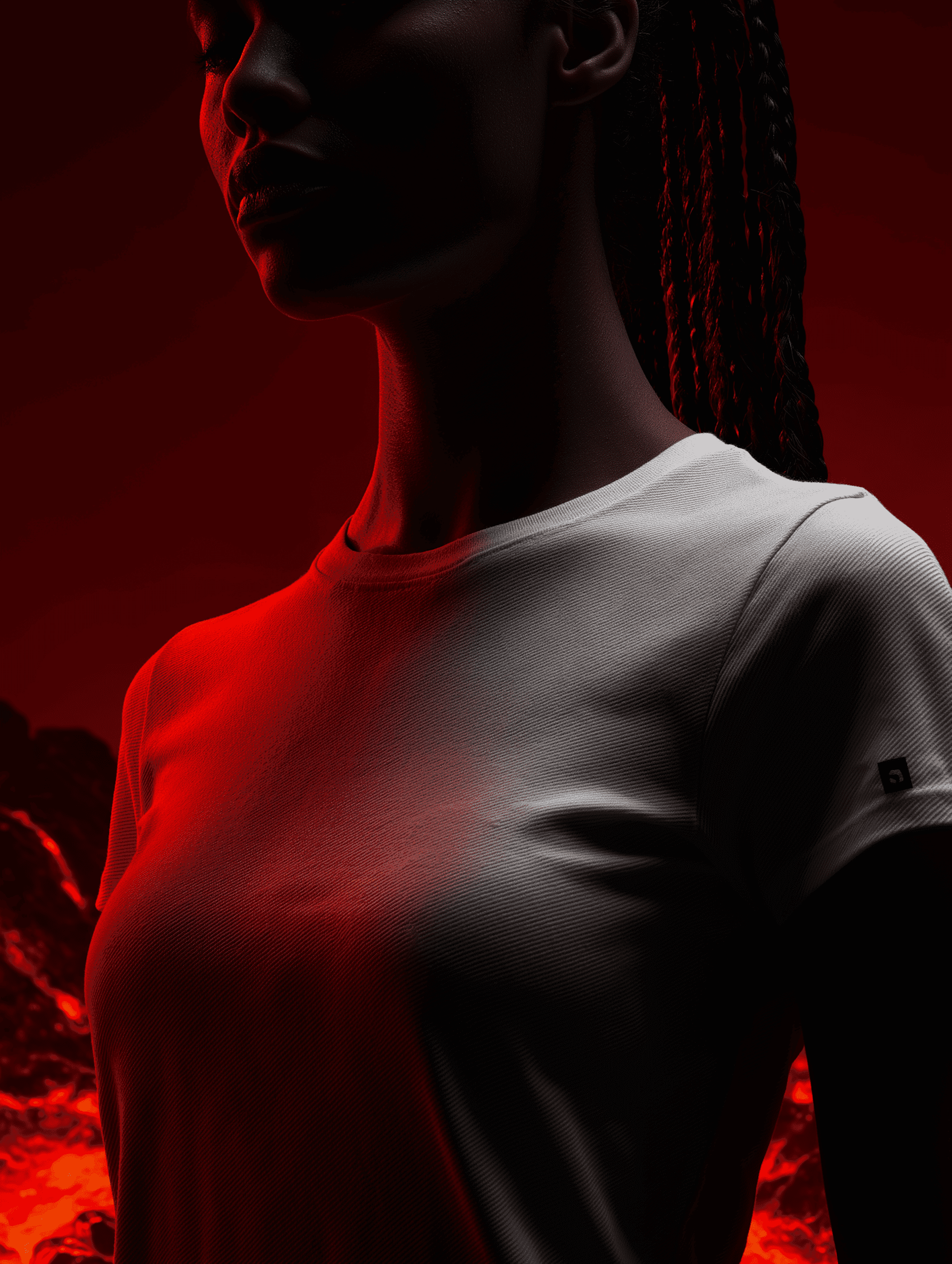 Woman in white top with ponytail turned sideways, illuminated by red accent light