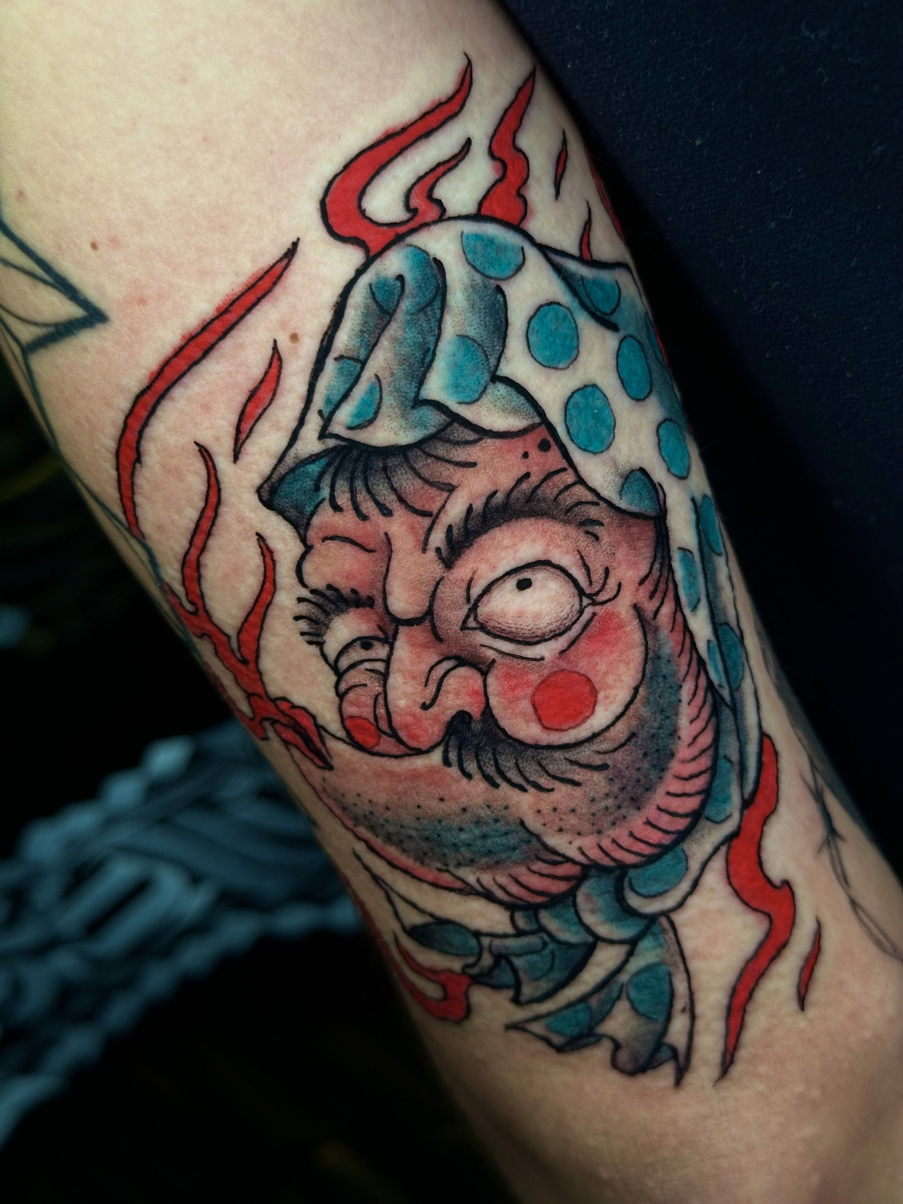 tatuaggio sull'avambraccio in stile chicano