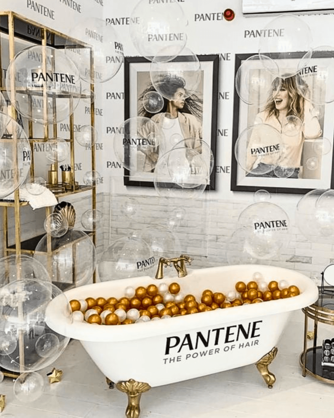 Baluma event styling for a brand activation featuring balloon decor and logo backdrops.