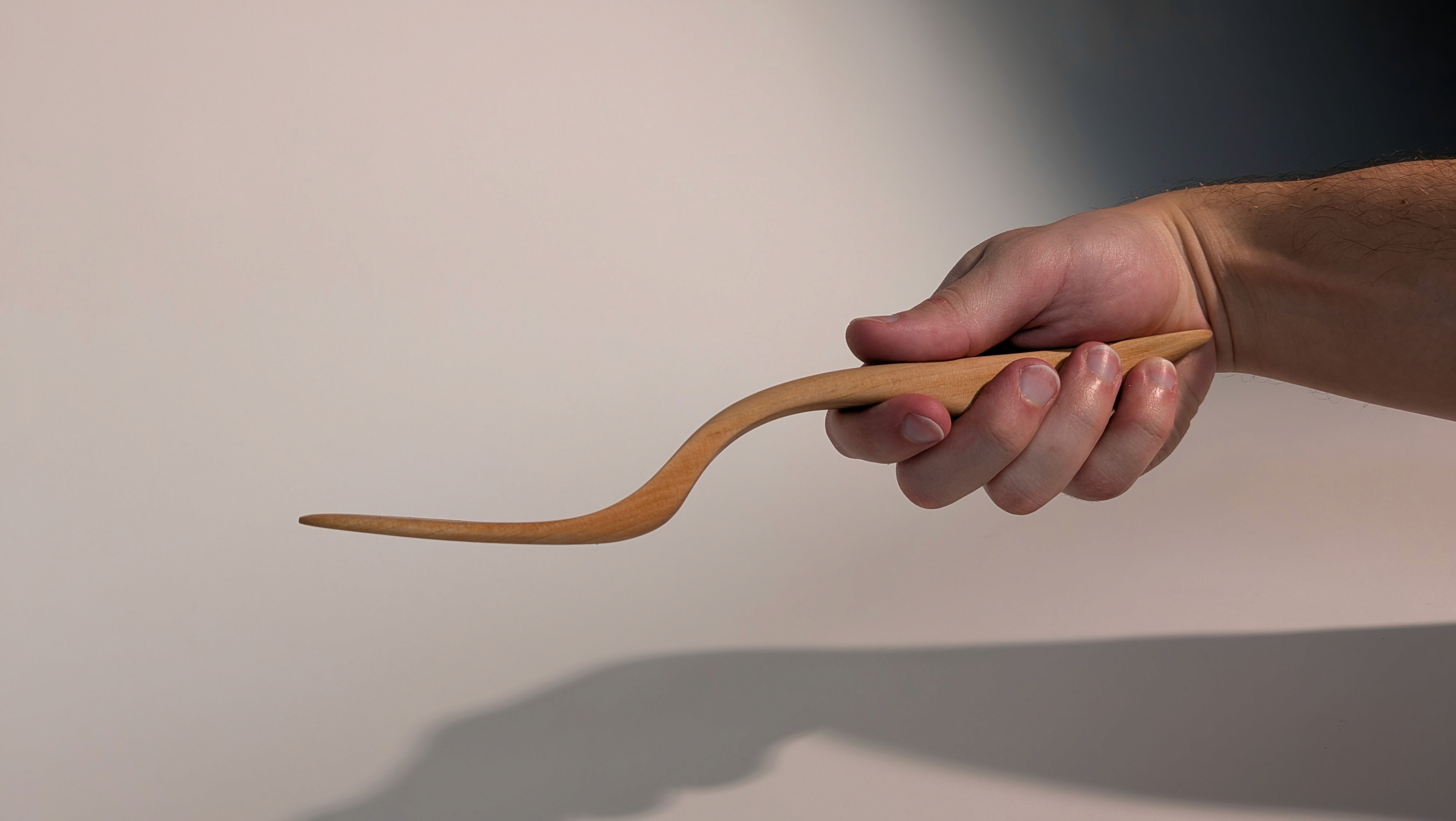 The handle of this flowform is really its magic; from a strict side profile it apears to be a simple elongated "S" curve. Mass is added at each curves change of direction for a weight distribution that feels natural. Combined with the top orthographic design, this creates a handle that allows the hand to grasp with maximum control, and minimum force required.