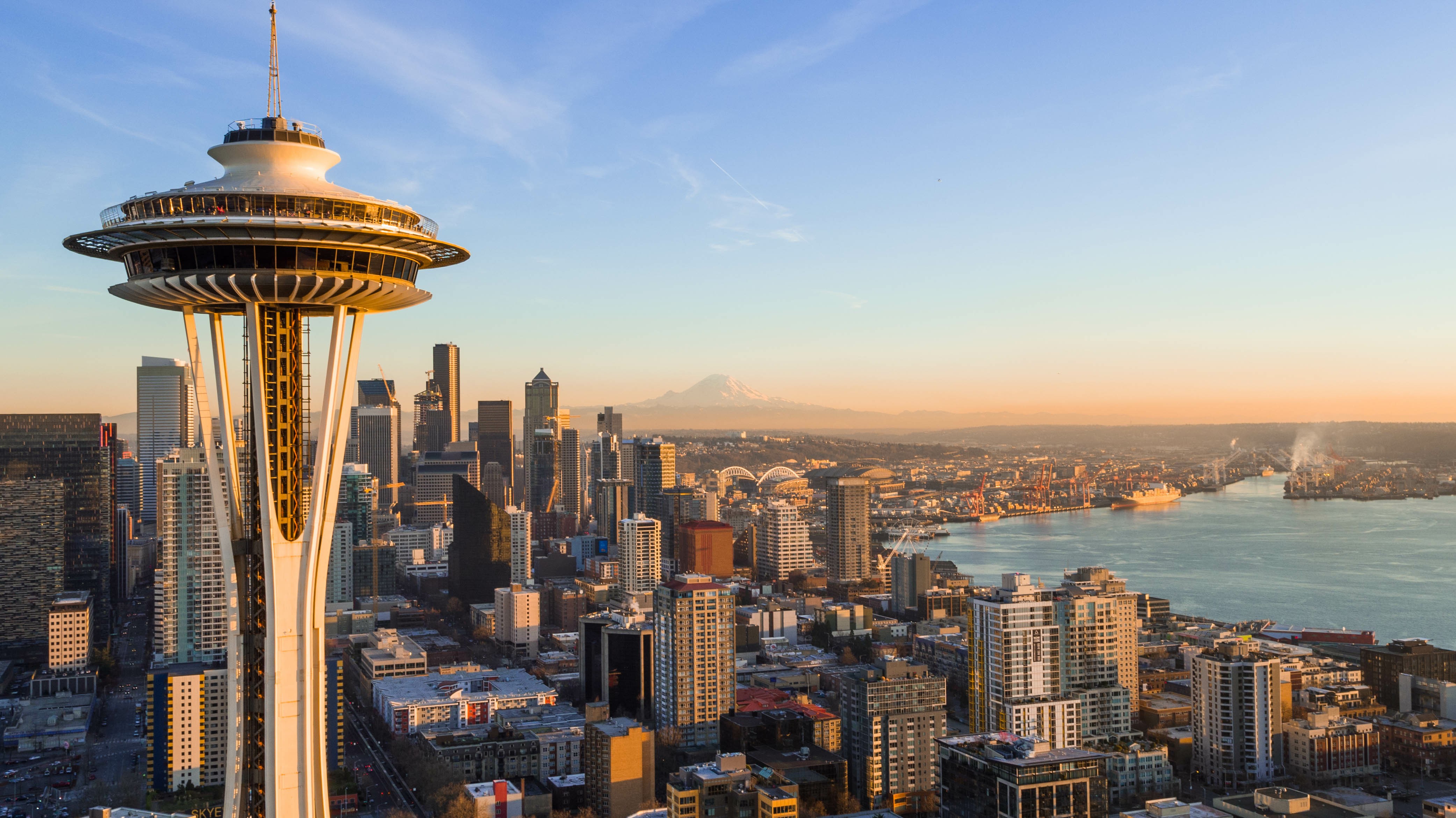 Seattle Space Needle, skyline, and waterfront at sunset