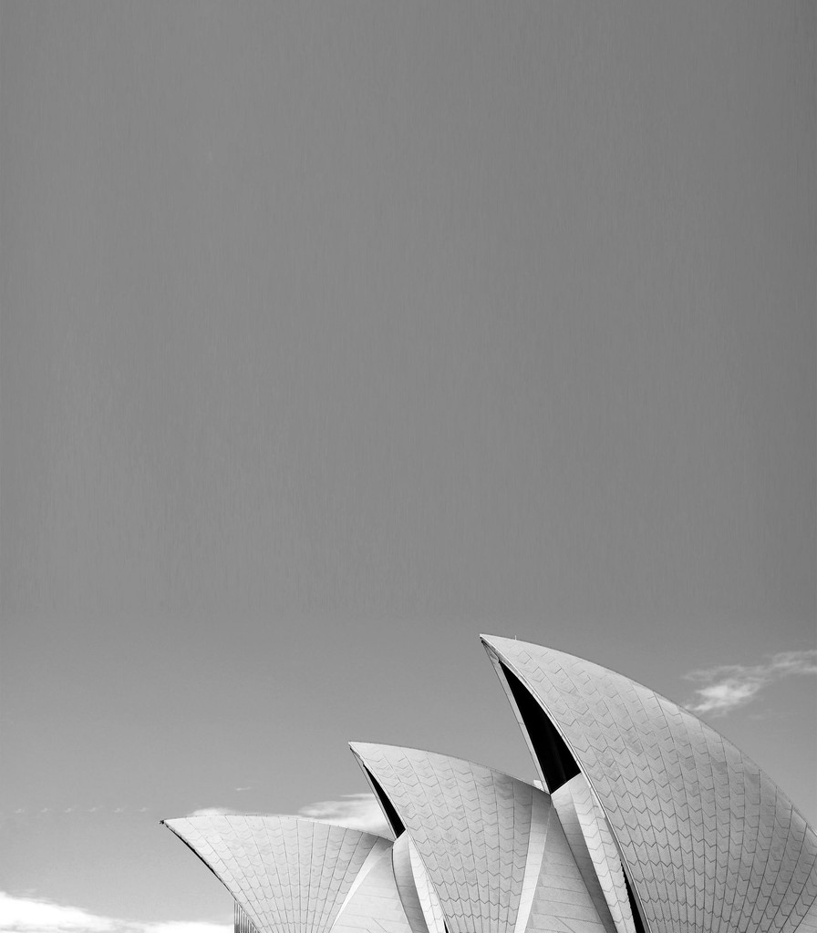 Close-up of the Sydney Opera House shells against a grey sky