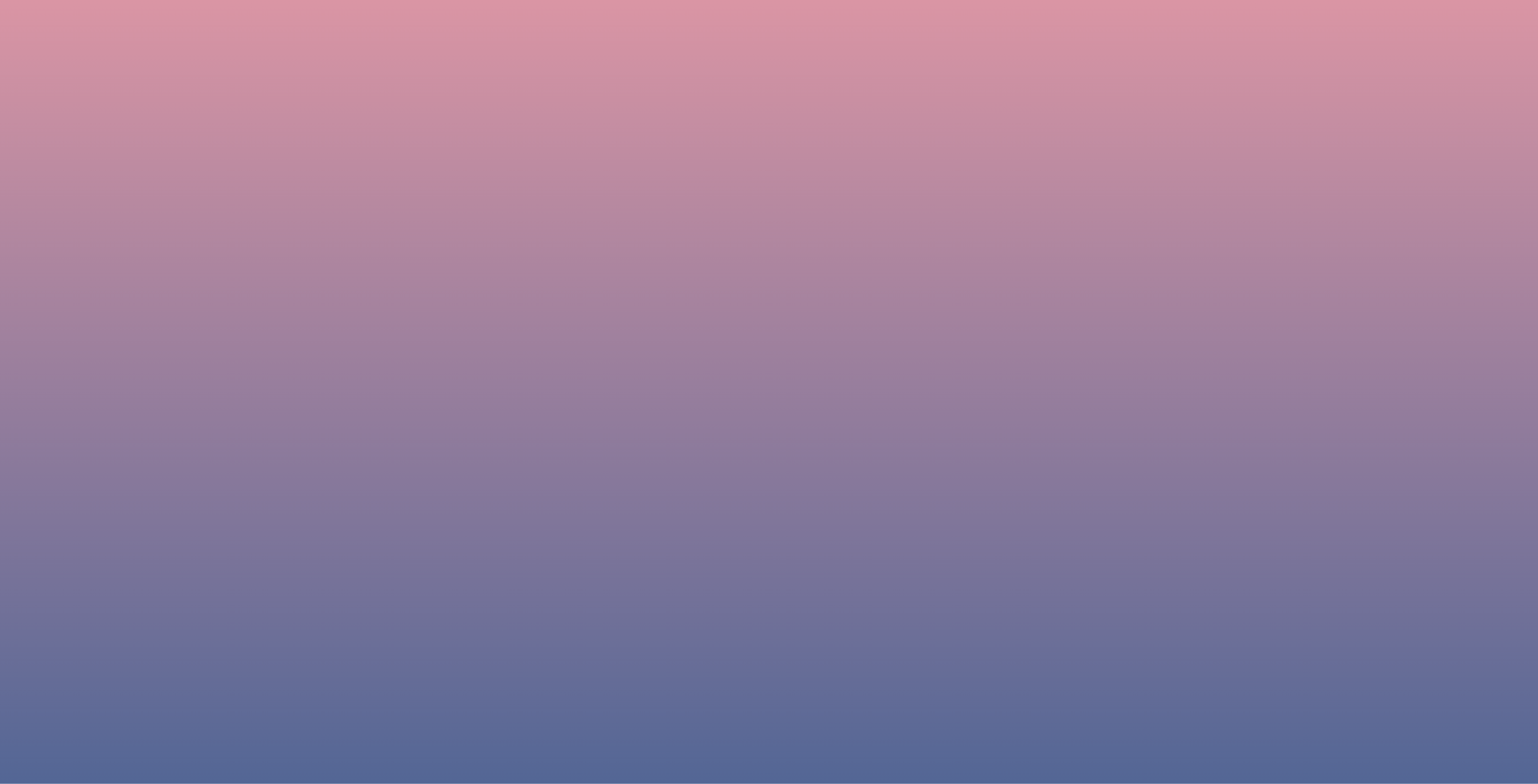 A vintage taxi parked near some traffic cones.