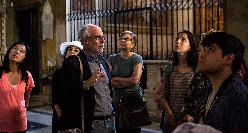 Lecturer describing a historical site