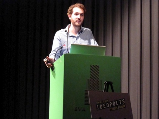 a young man gives a speech at the Ideopolis exhibition