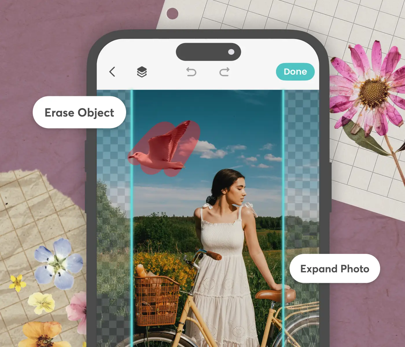 Phone showing photo editing tools 'Erase Object' and 'Expand Photo' beside pressed flower decorations