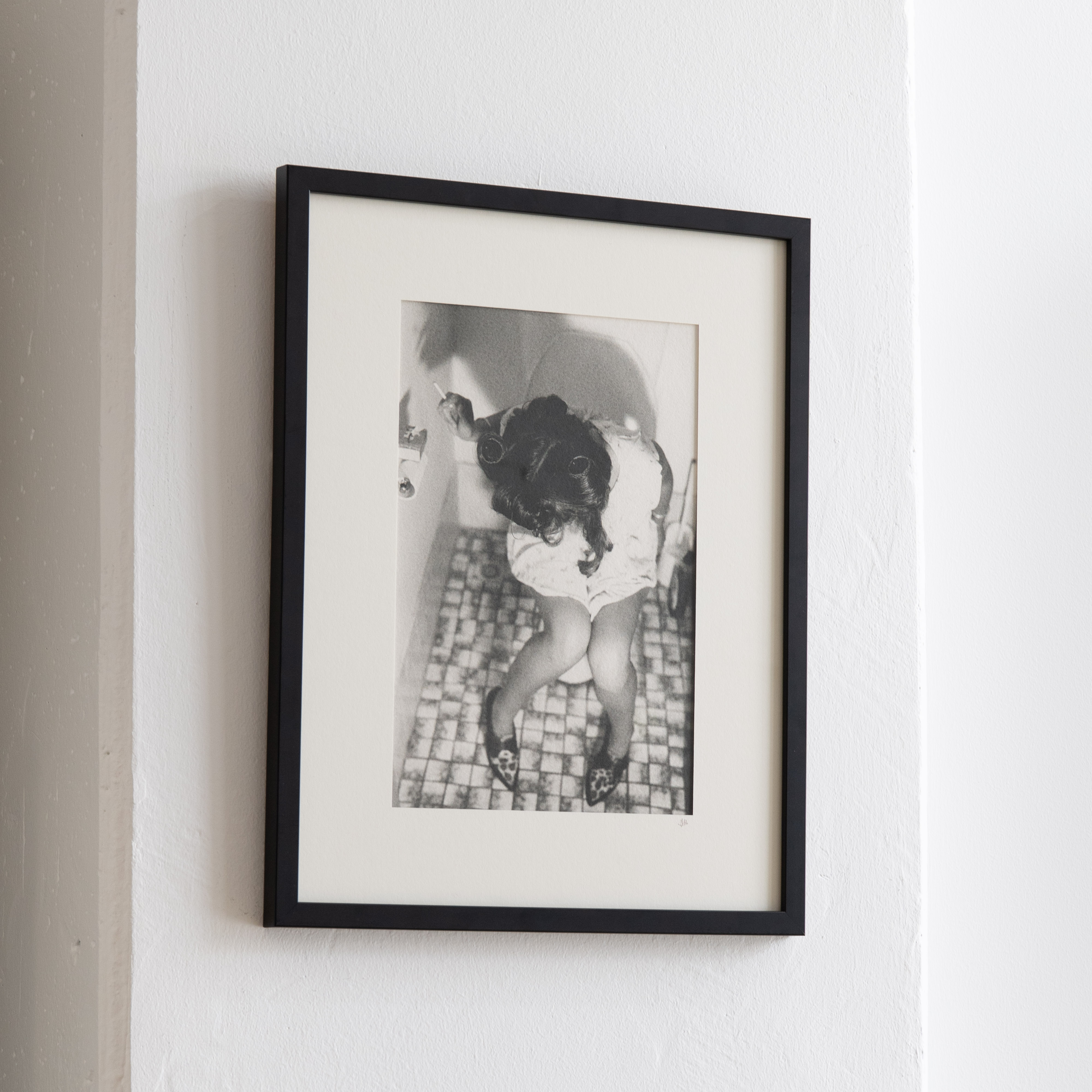 Darkroom prints drying on wire racks