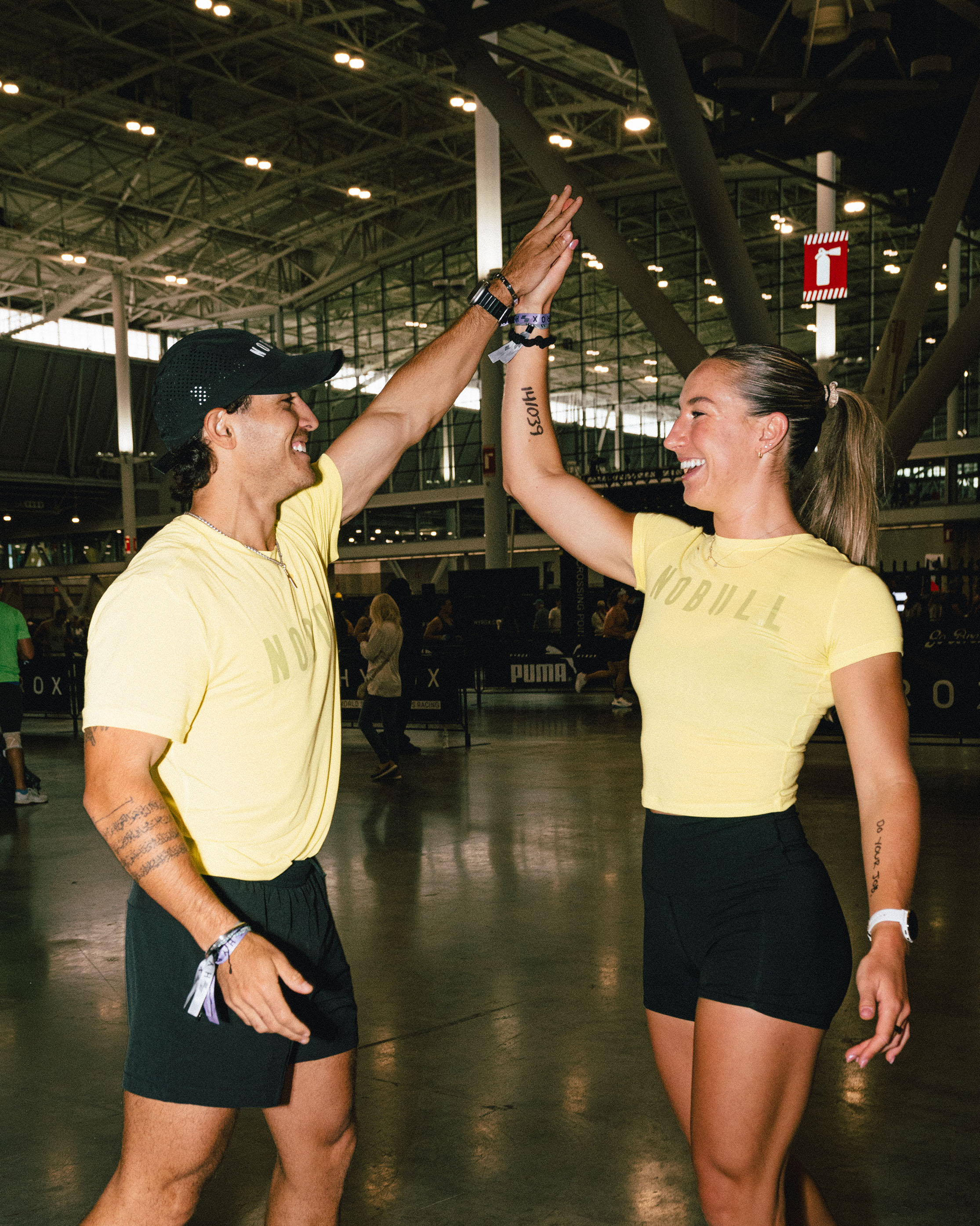 Woman and man high fiving