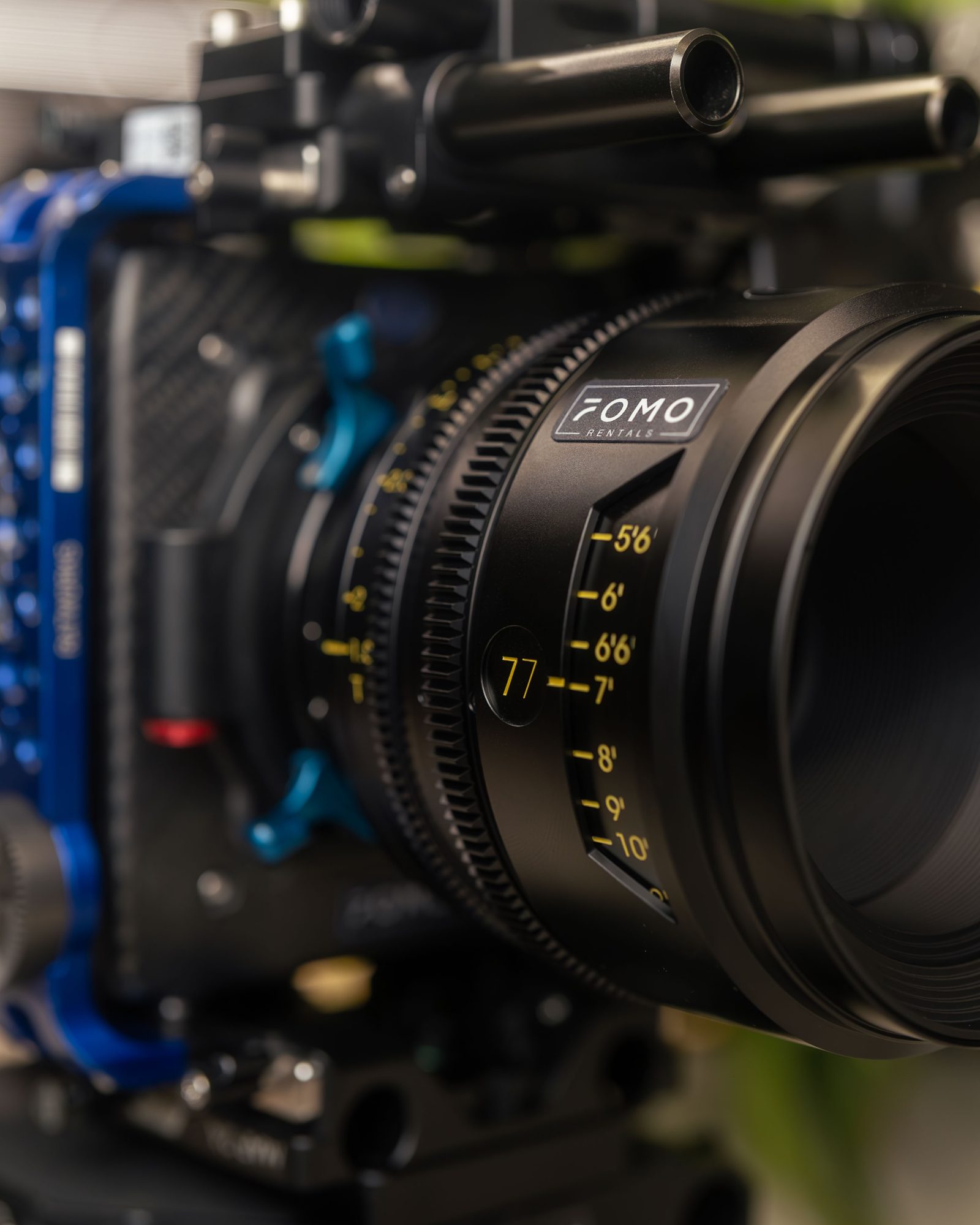 A FOMO camera cage with a cine lens