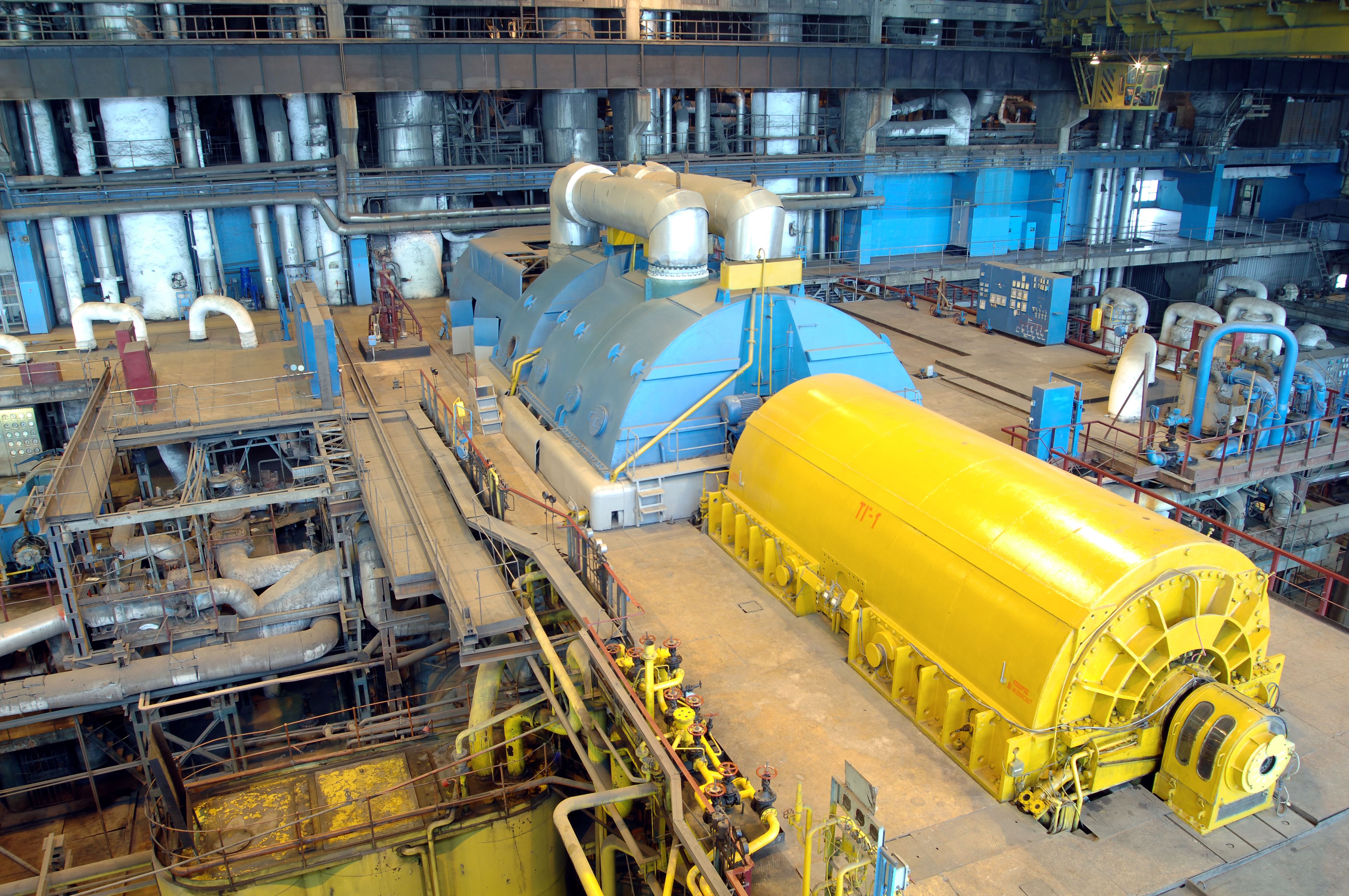 Steam turbine system with insulated piping, turbine casing, and generator couplings