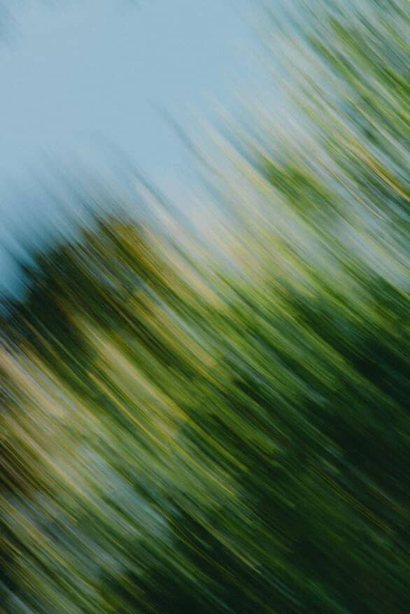 People playing pool with balls in motion