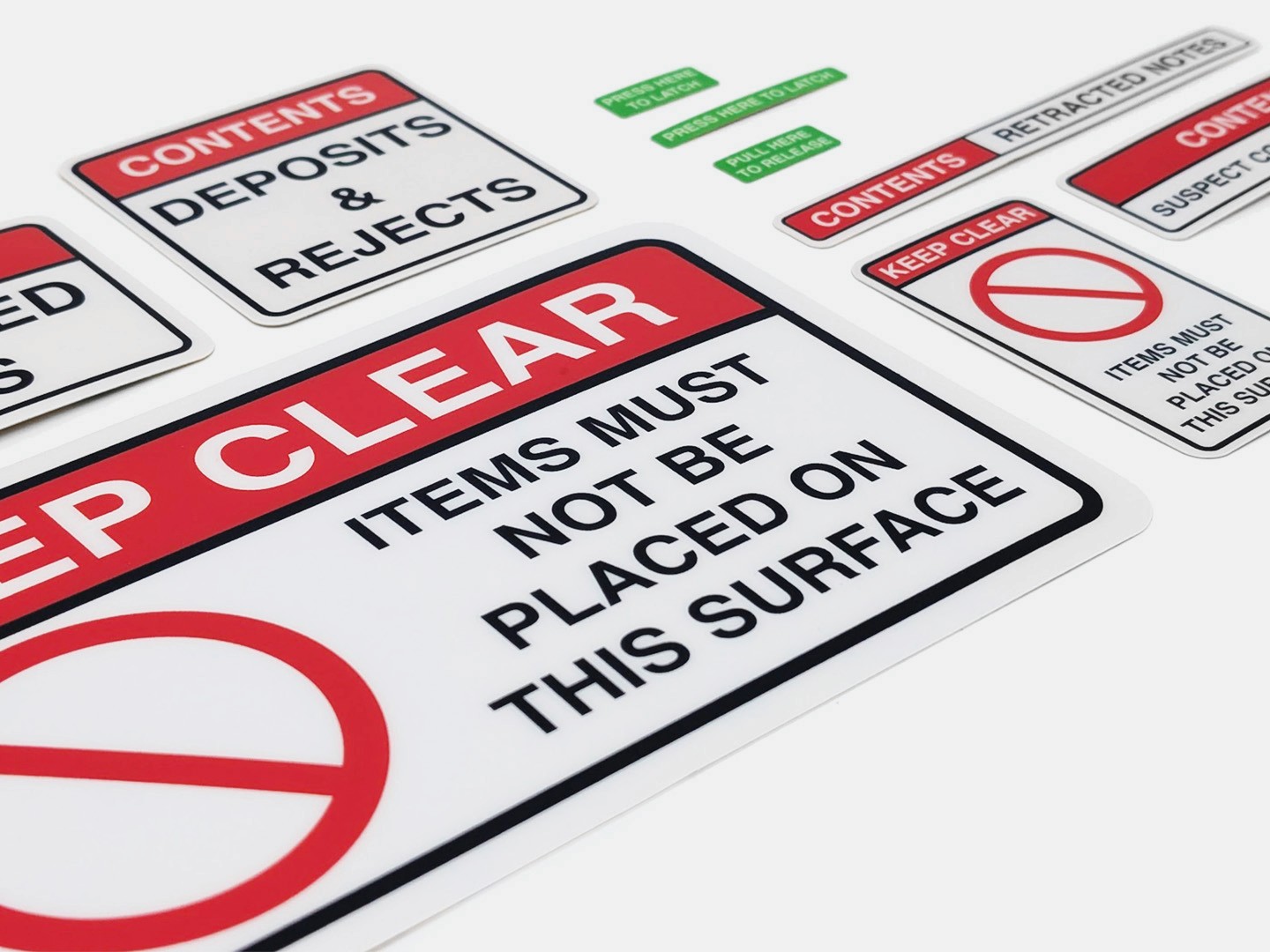 ATM service and notification decals – red and white labels for safety and maintenance instructions