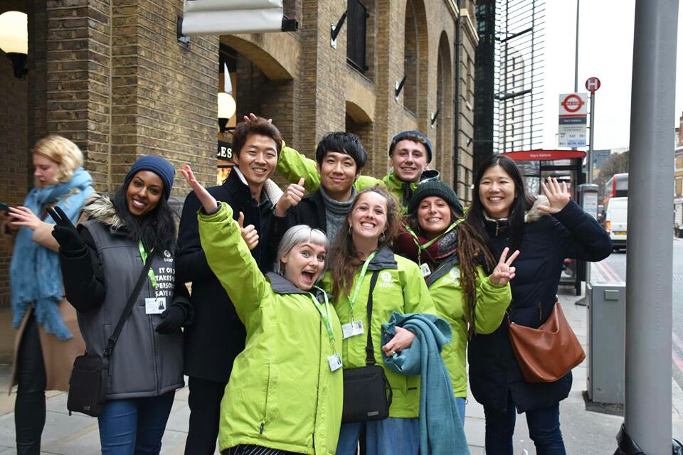 person writing on a piece of paper 