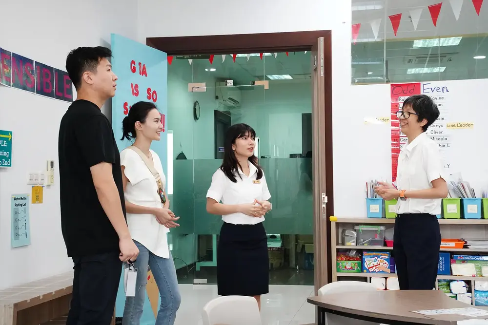 Two people having a picnic on the grass