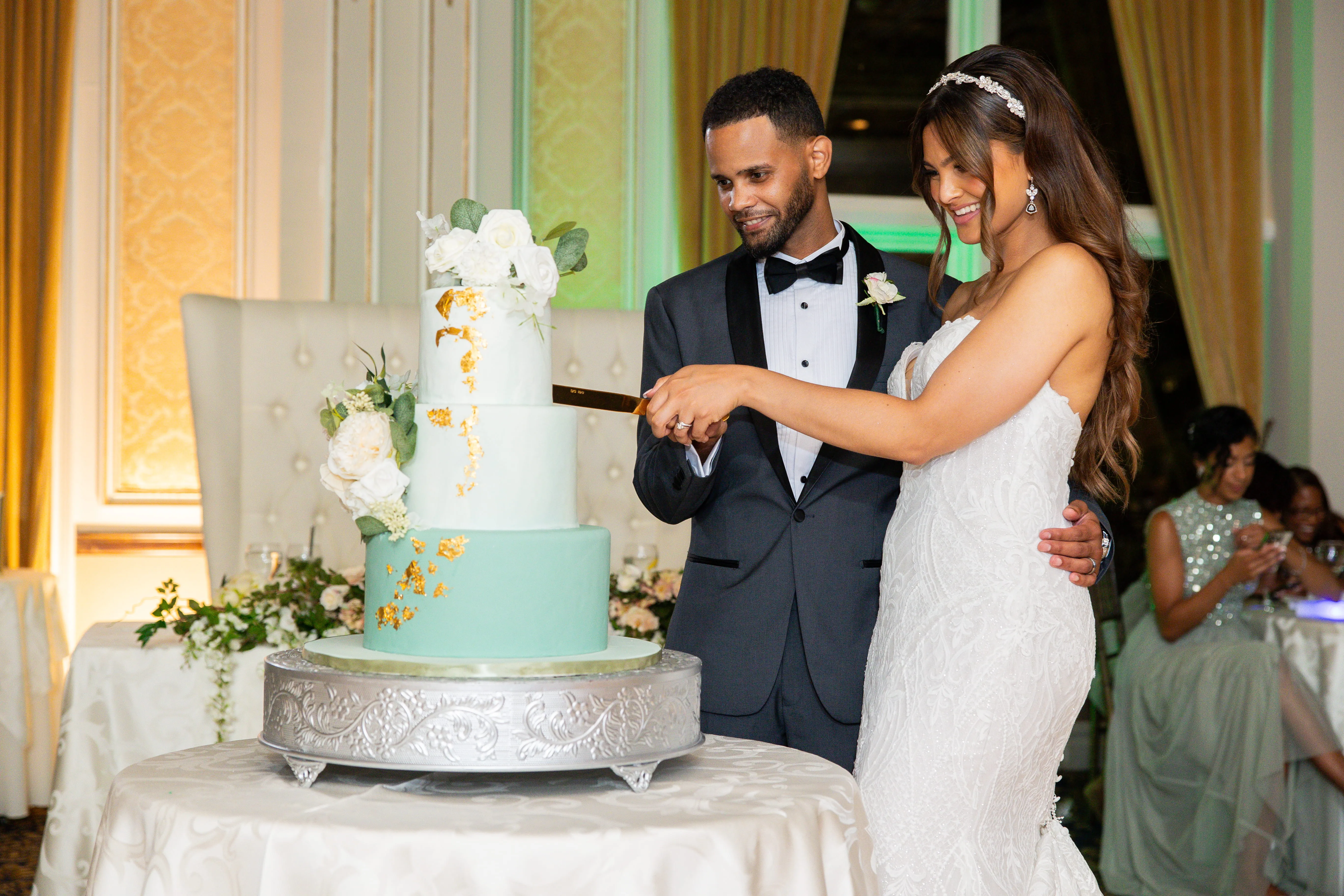 Wedding couple cutting cake at VIP Country Club reception in Westchester County