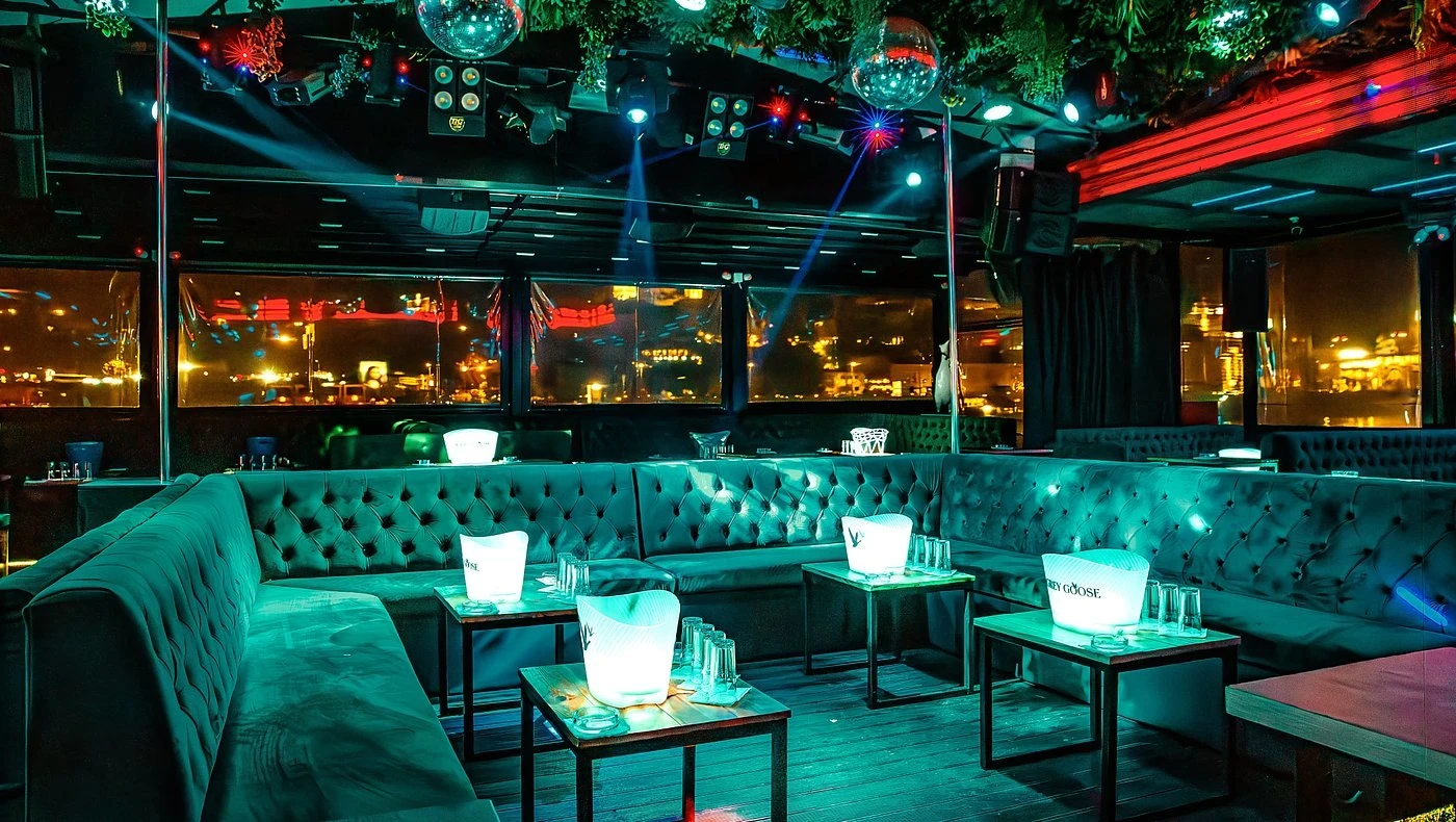 Splav Tag nightclub interior with dance floor and DJ stage, located in Belgrade, Serbia