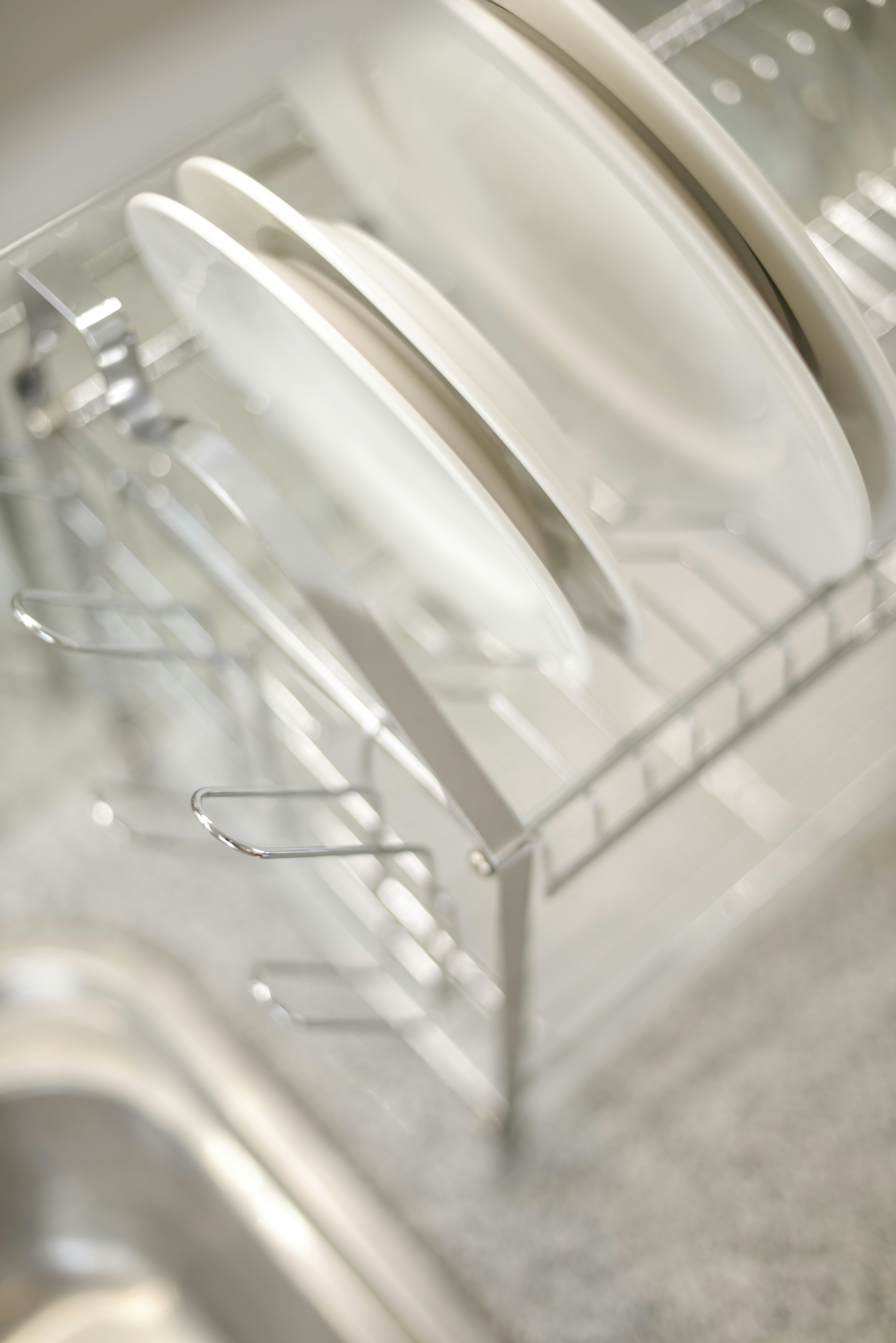 a-close-up-of-a-dish-rack-in-a-kitchen - didi-paul (unsplash)./pho