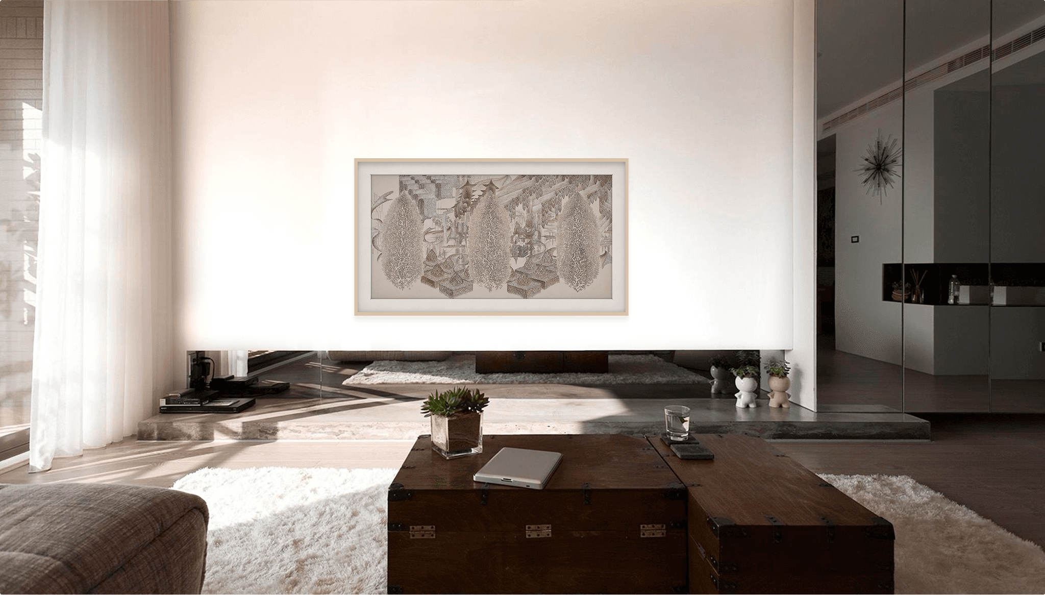 Image of people at a desk with their computers