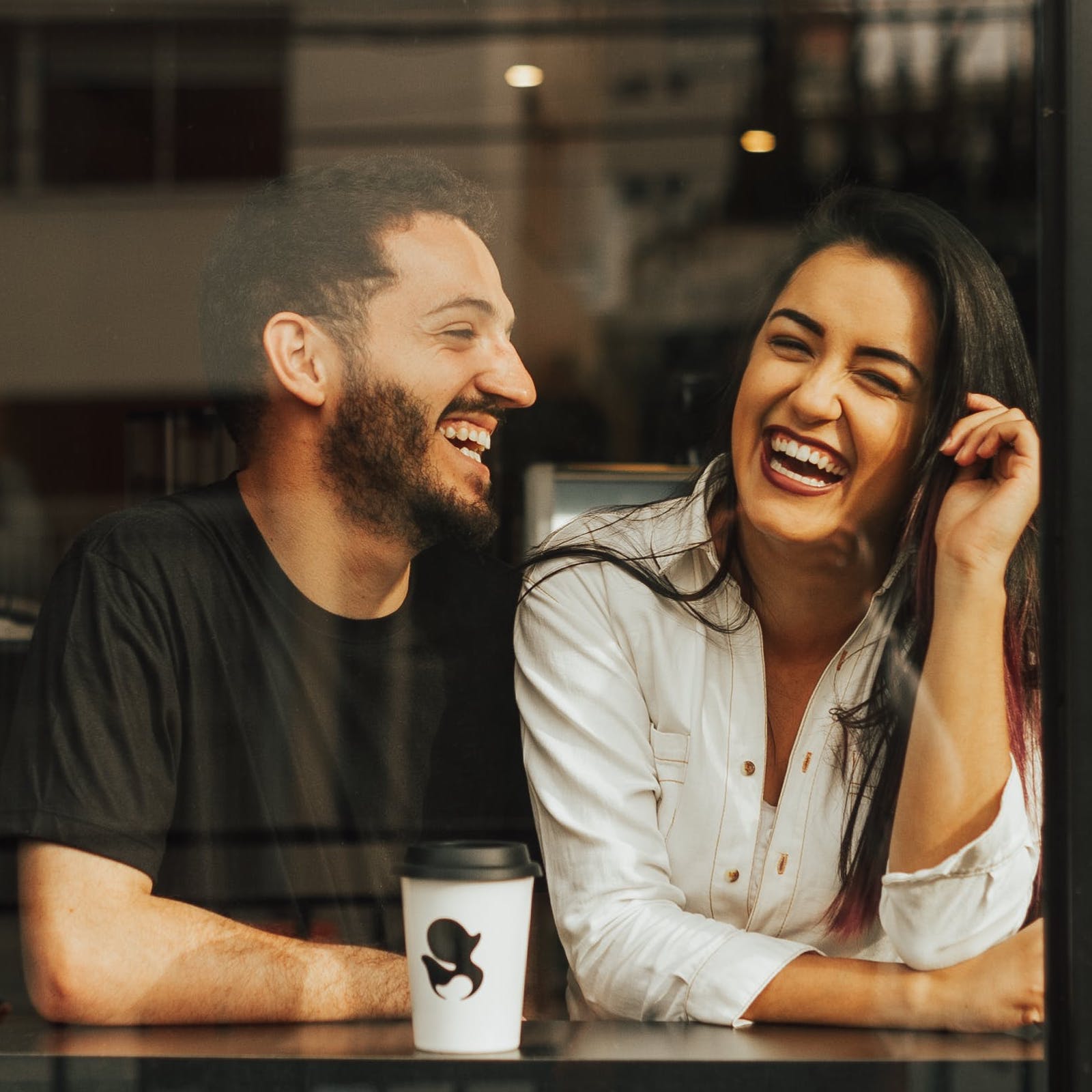 Happy Customers enjoying coffee in a Melbourne cafe.