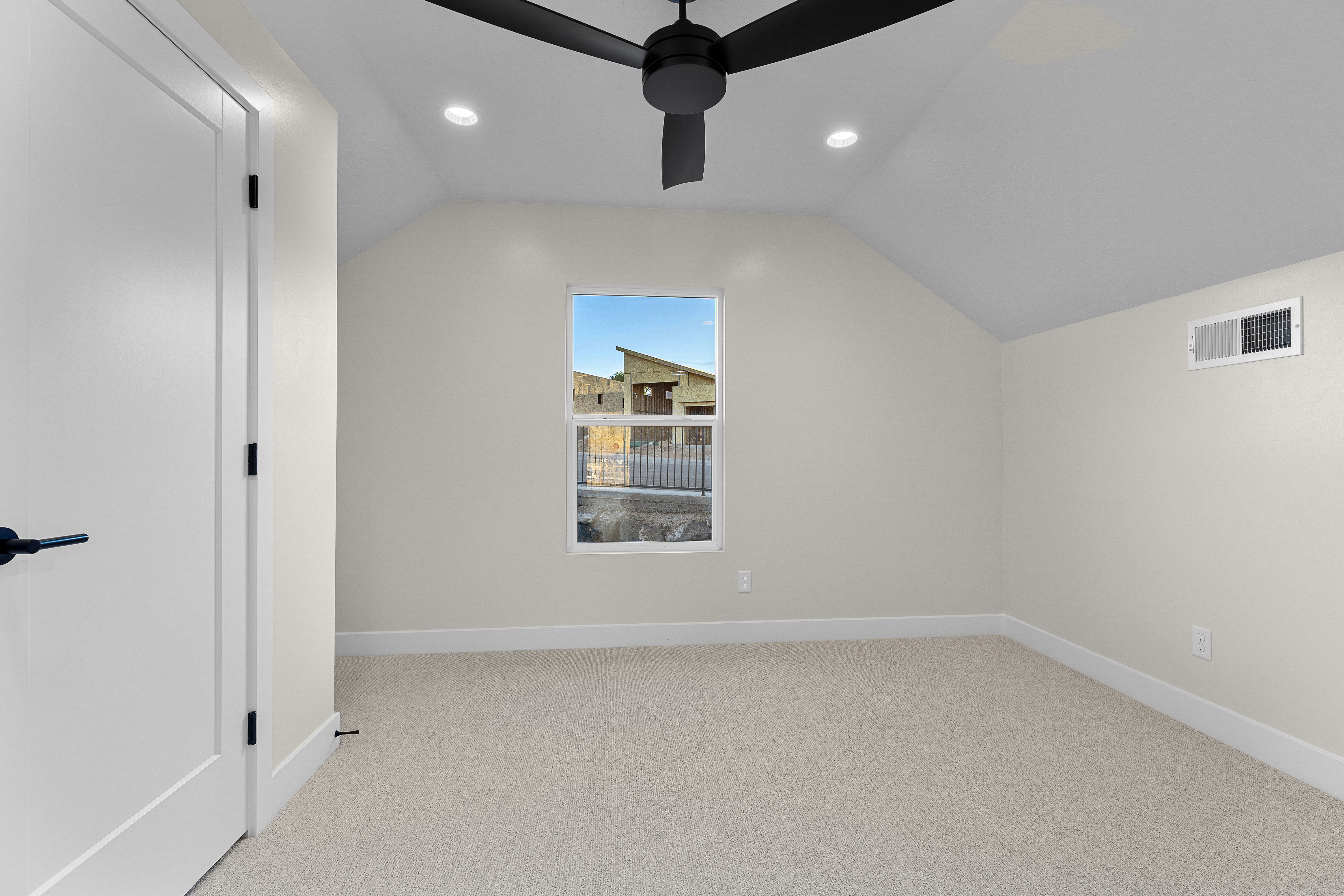 Guest bedroom in a custom home in Hurricane Utah with simple and comfortable design